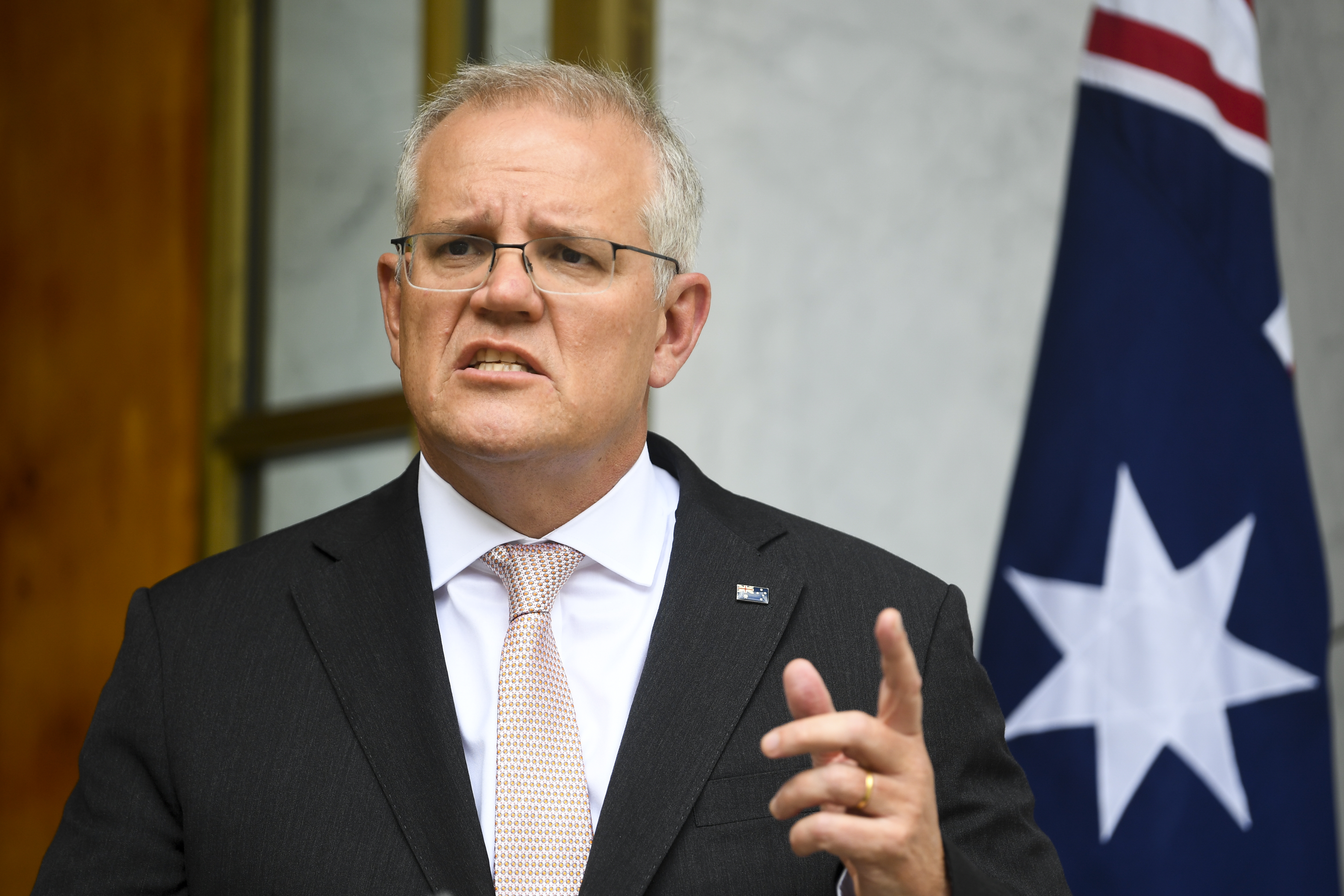 Australian Prime Minister Scott Morrison speaks to the media during a press conference following a national cabinet meeting, at Parliament House in Canberra, Thursday, January 13.