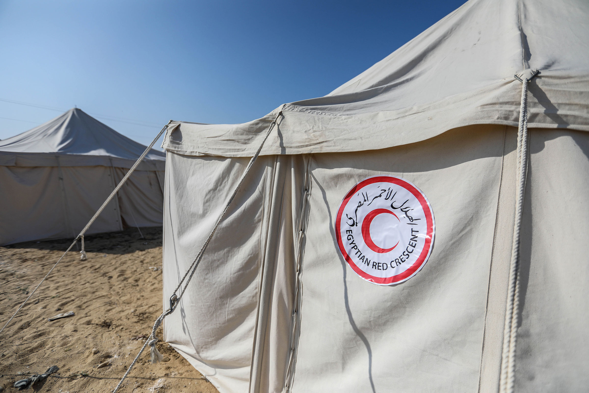 Tents erected by the Egyptian and Palestinian Red Crescent for Palestinians displaced by the ongoing Israeli attacks on Gaza on December 31, 2023 in Al-Mawasi, Gaza. 
