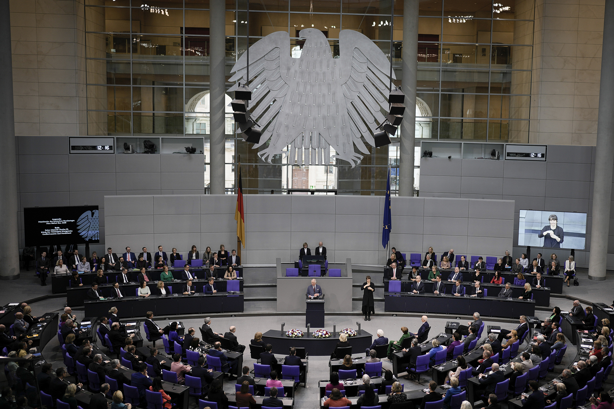 Britain's King Charles III, center, addresses the Bundestag, Germany's Parliament, in Berlin, Germany, on March 30.