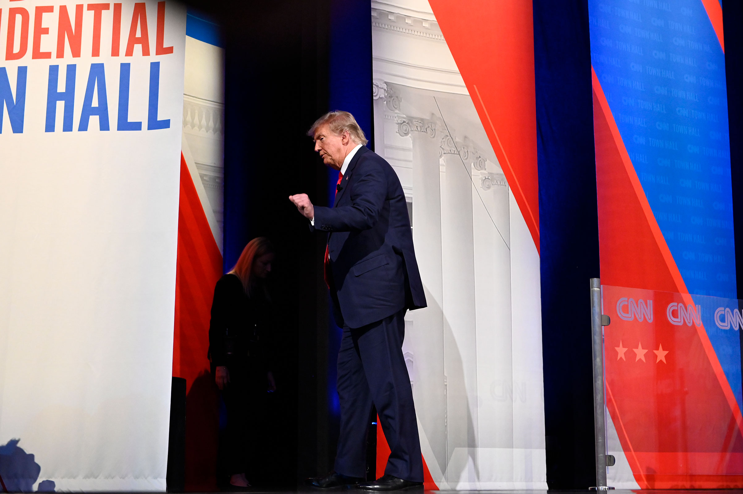 Former President Donald Trump walks offstage during a CNN Republican Town Hall moderated by CNN’s Kaitlan Collins at St. Anselm College in Manchester, New Hampshire, on Wednesday, May 10, 2023.