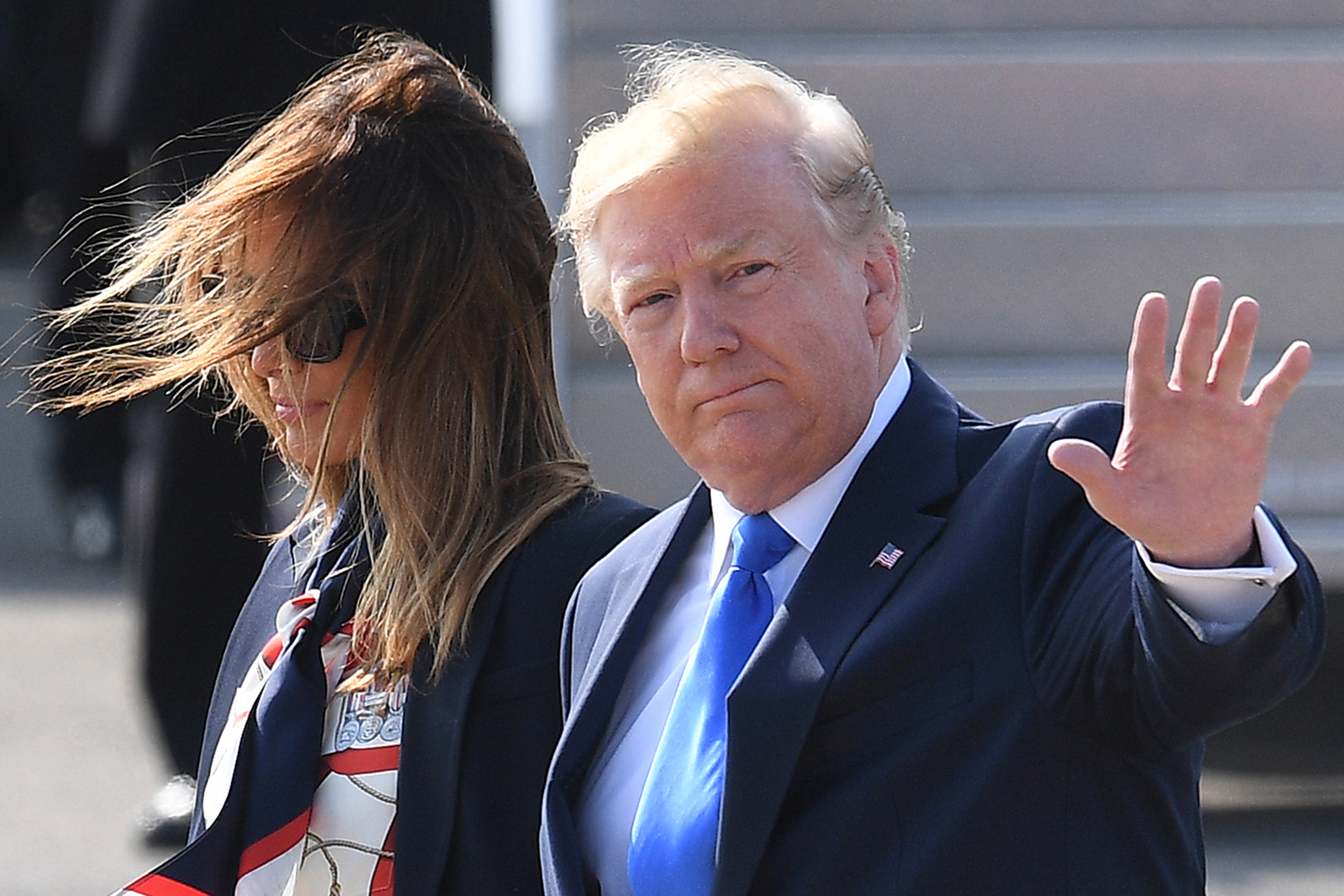 President Trump and First Lady Melania Trump arrive at Stansted Airport on Monday in London, England. 