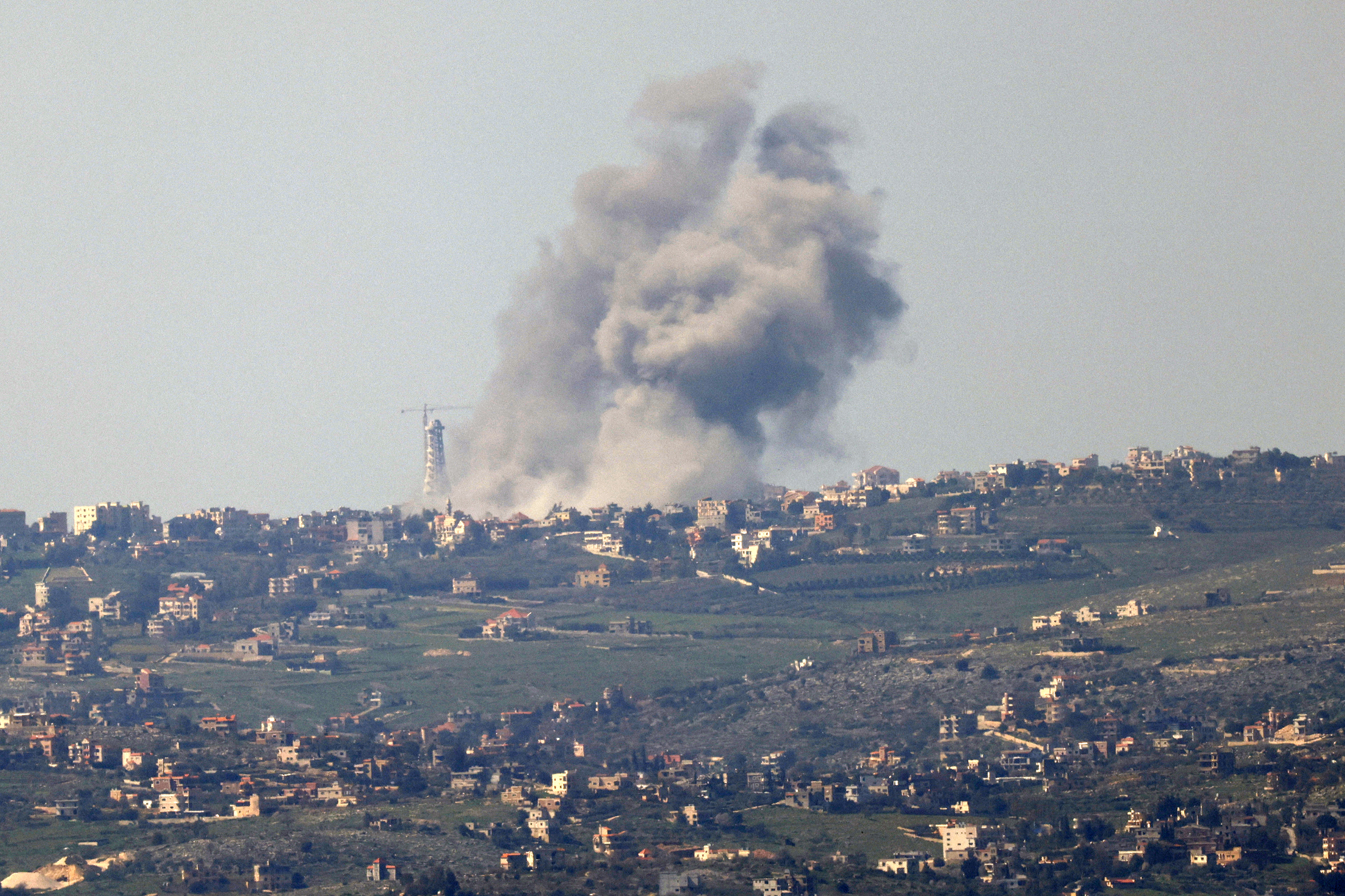Smoke billows above the Lebanese village of Bint Jbeil during Israeli bombardment on February 28.