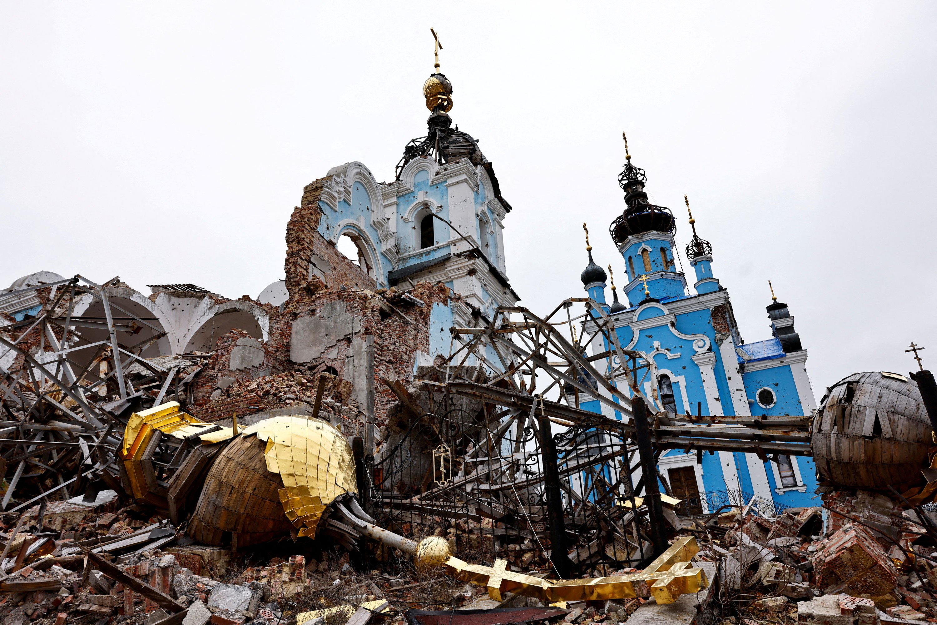 The dome of the Orthodox Church of the Holy Mother of God Joy of All Who Sorrow lies next to its building, destroyed as a result of shelling in the village of Bohorodychne, in the eastern region of Donetsk, Ukraine, on March 18, 2023.