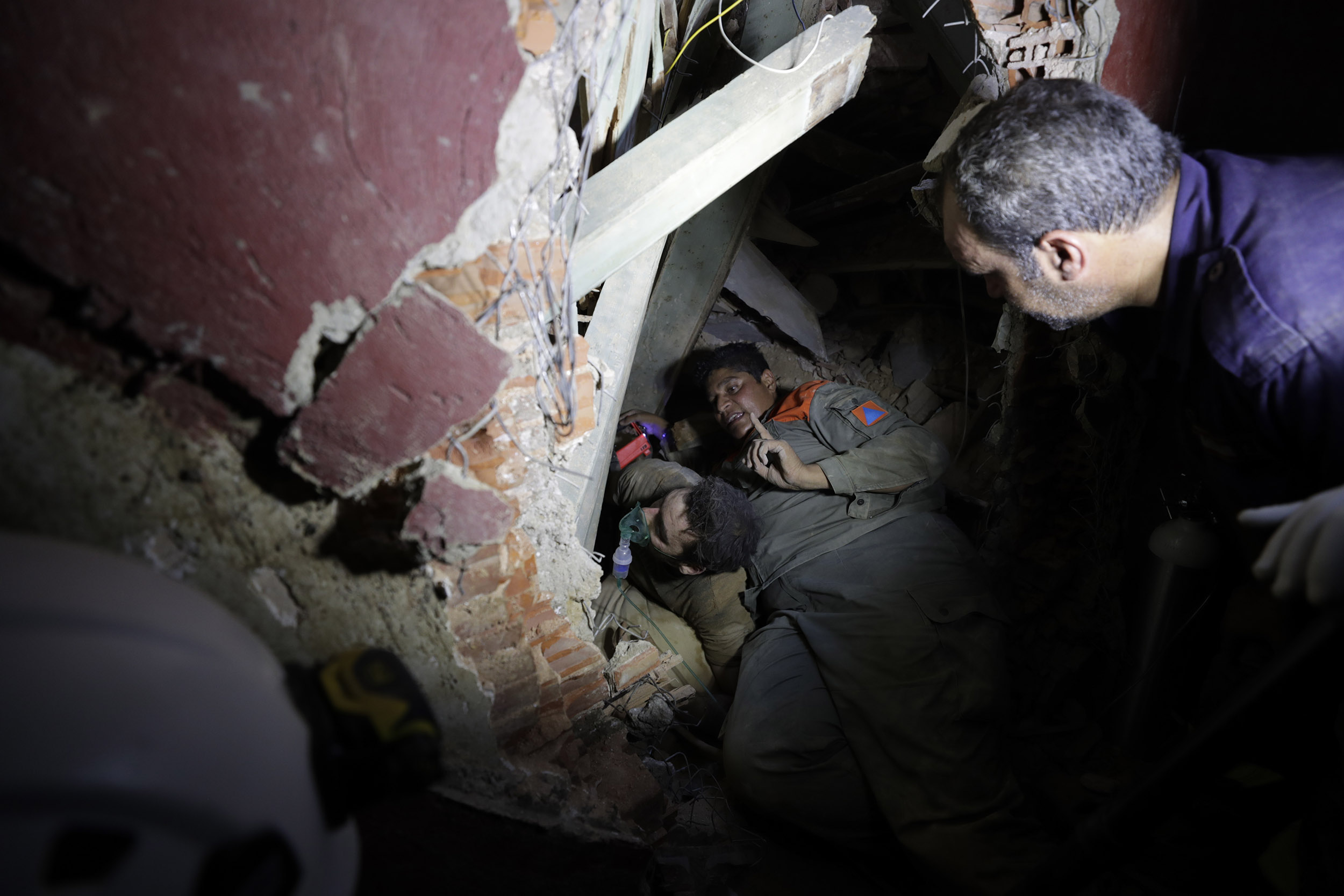 Lebanese soldiers search for survivors after a massive explosion in Beirut, Lebanon, on Wednesday, August 5.