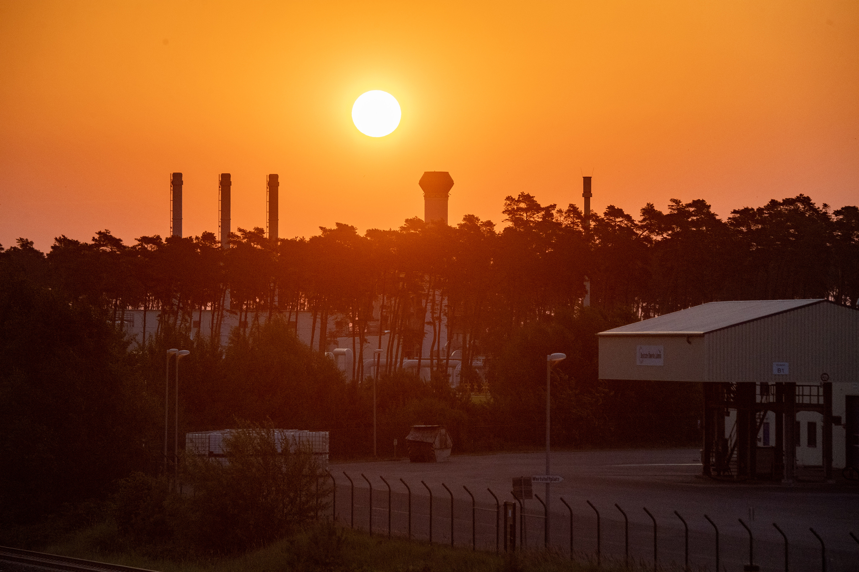 Sunrise over the gas receiving station of the Nord Stream 1 pipeline is seen in Lubmin, Germany on July 21.