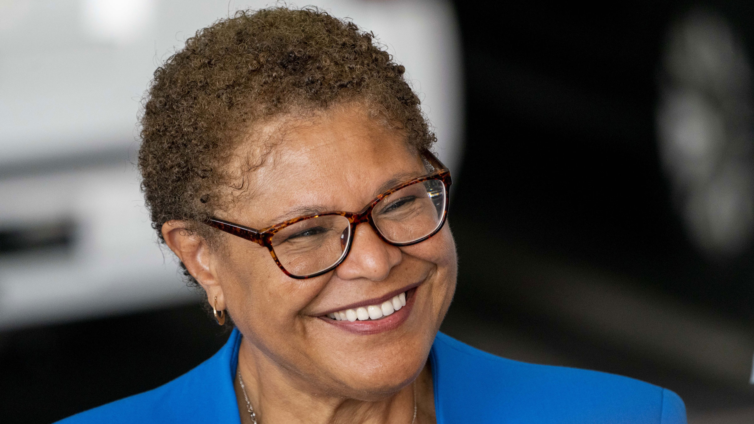 US Rep. Karen Bass talks the media at a polling location in Los Angeles on Tuesday.