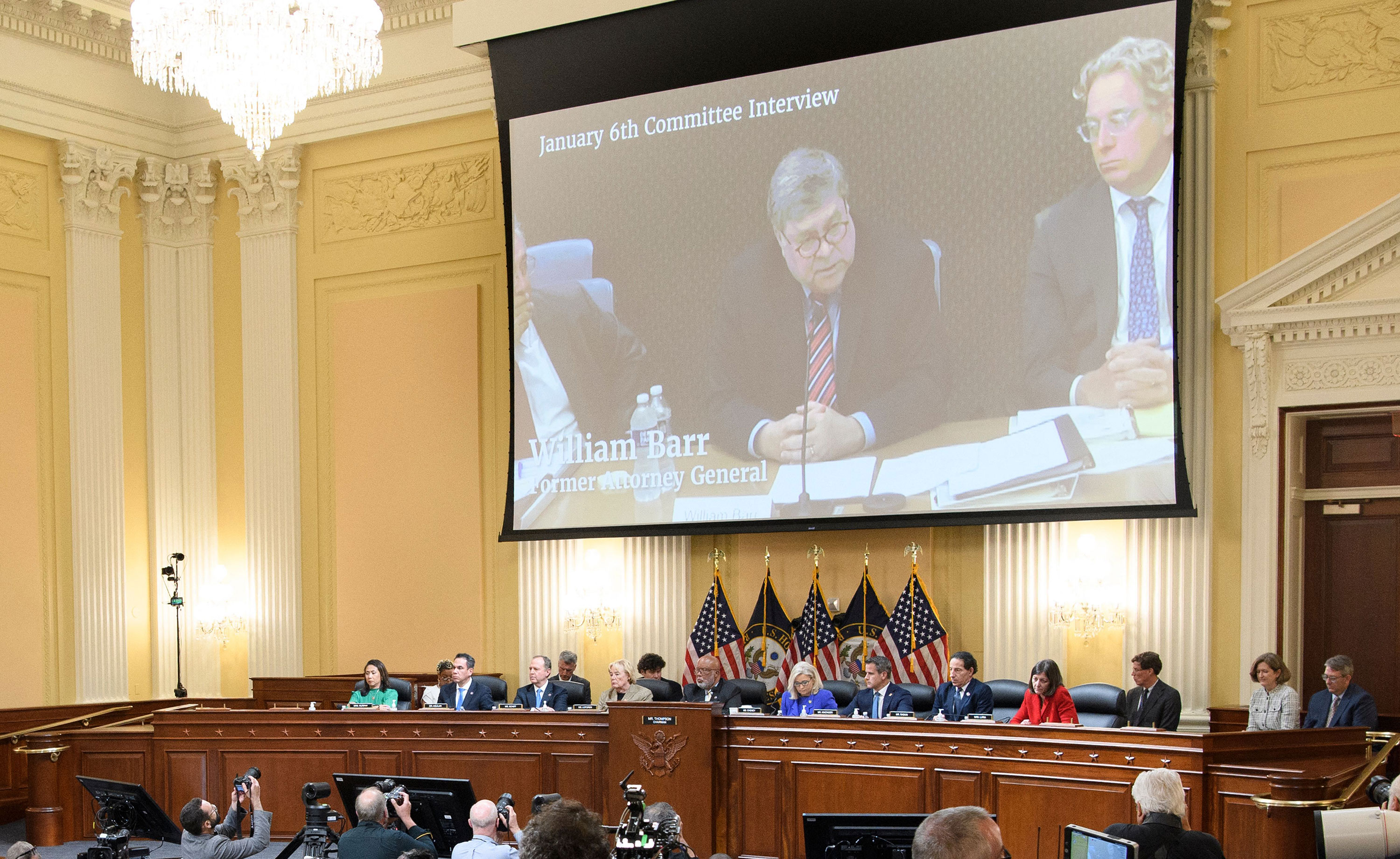 A video of Bill Barr was shown on screen during a hearing on June 9.