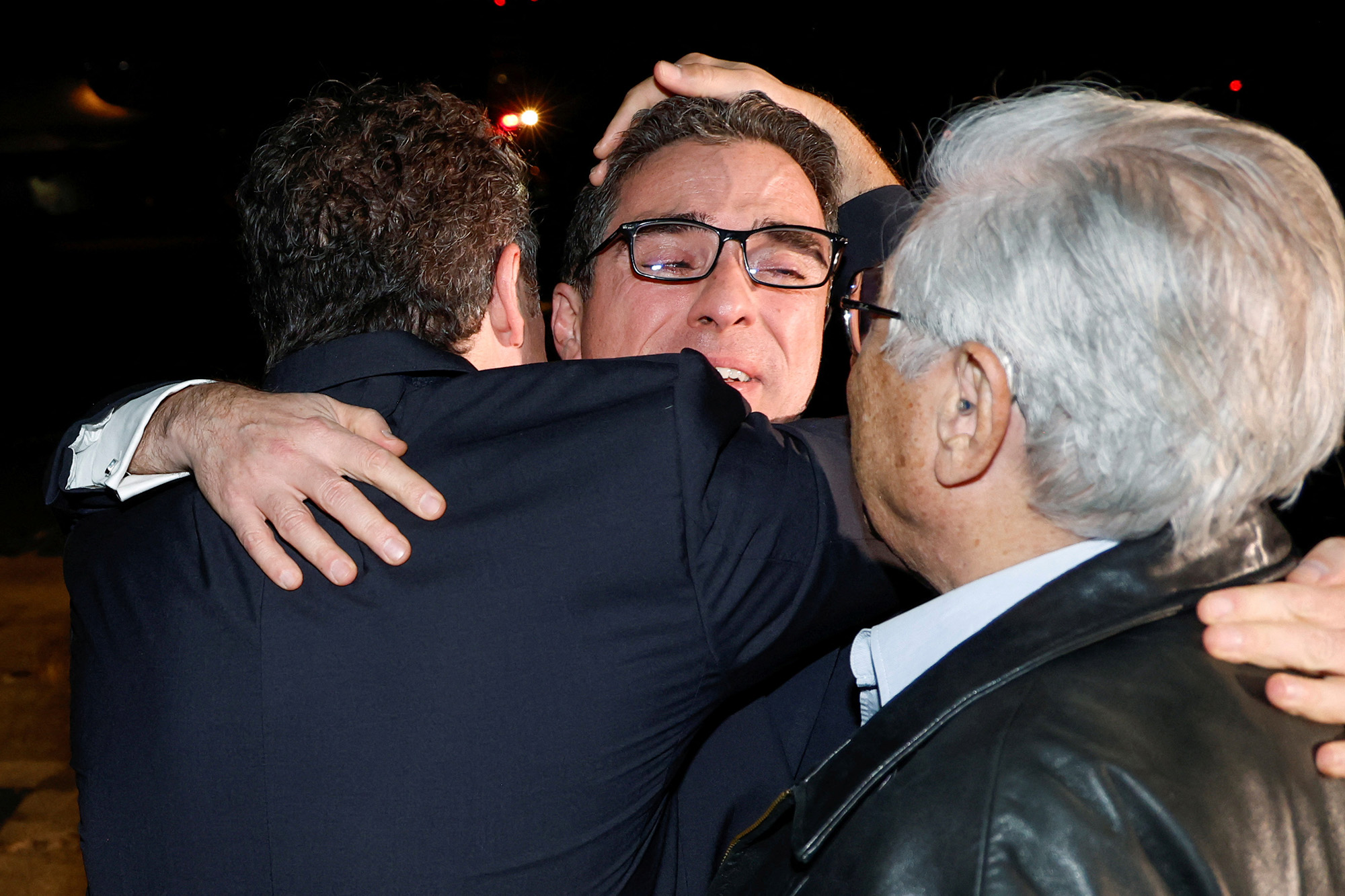 Family members embrace freed American Siamak Namazi after he and four fellow detainees were released in a prisoner swap deal between U.S and Iran and arrived at Davison Army Airfield at Fort Belvoir, Virginia, U.S., on September 19.