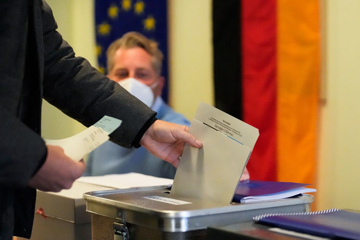 A man casts his vote for Germany's national parliament election at a polling station in Berlin.