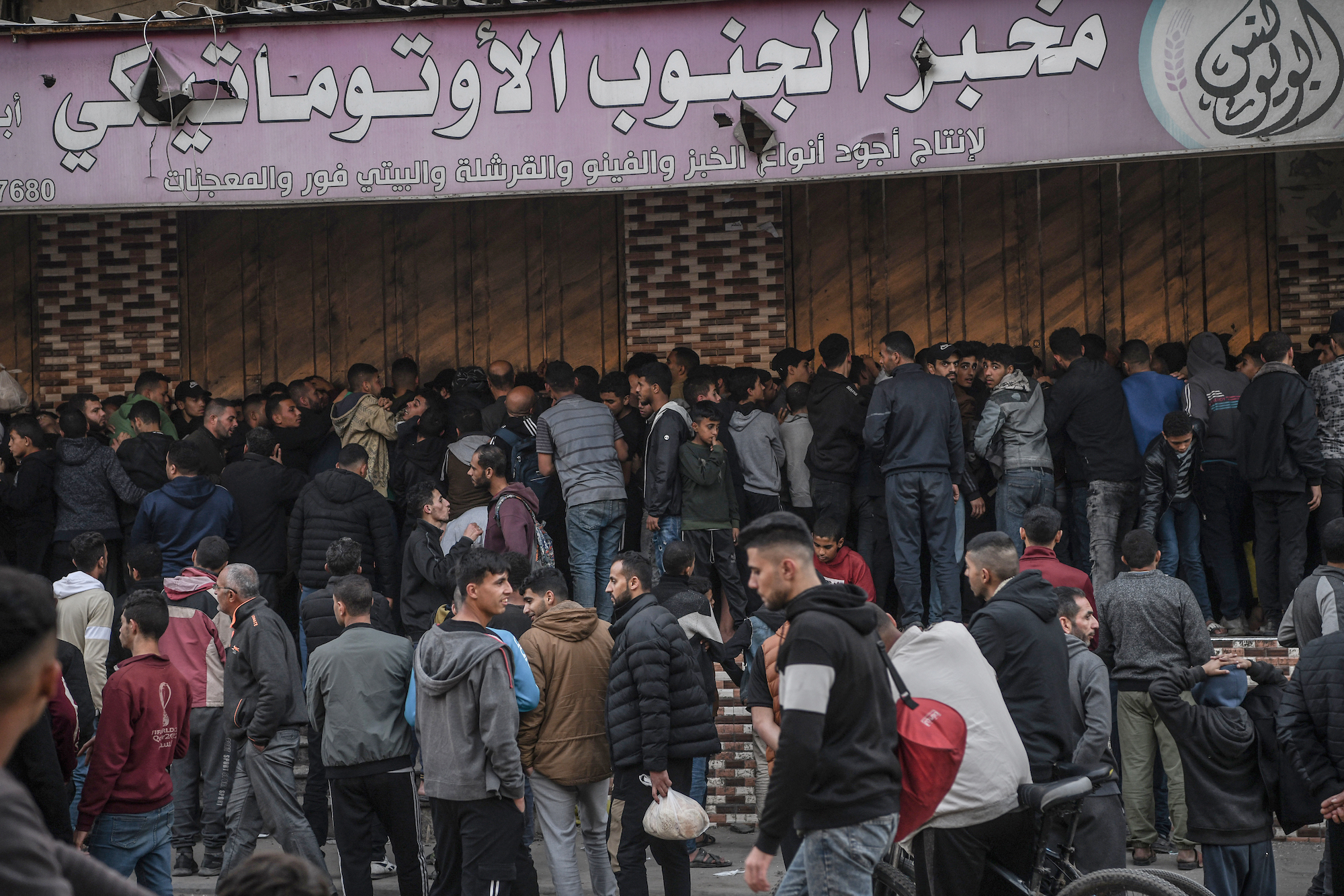 Palestinians line up in front a bakery in Rafah, Gaza, on Wednesday.
