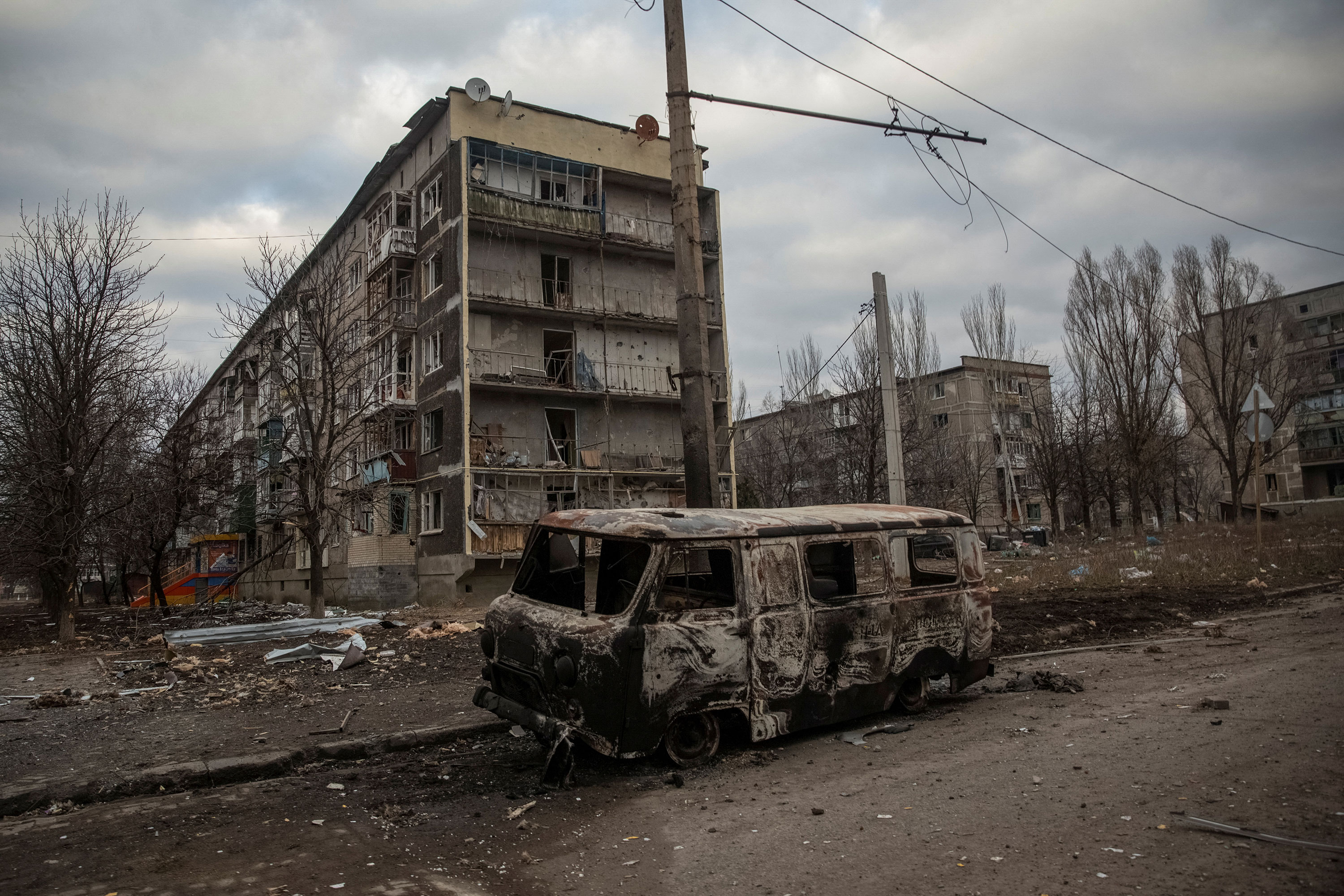 An empty street and buildings are seen damaged by a Russian military strike Bakhmut on Friday, March 3. 