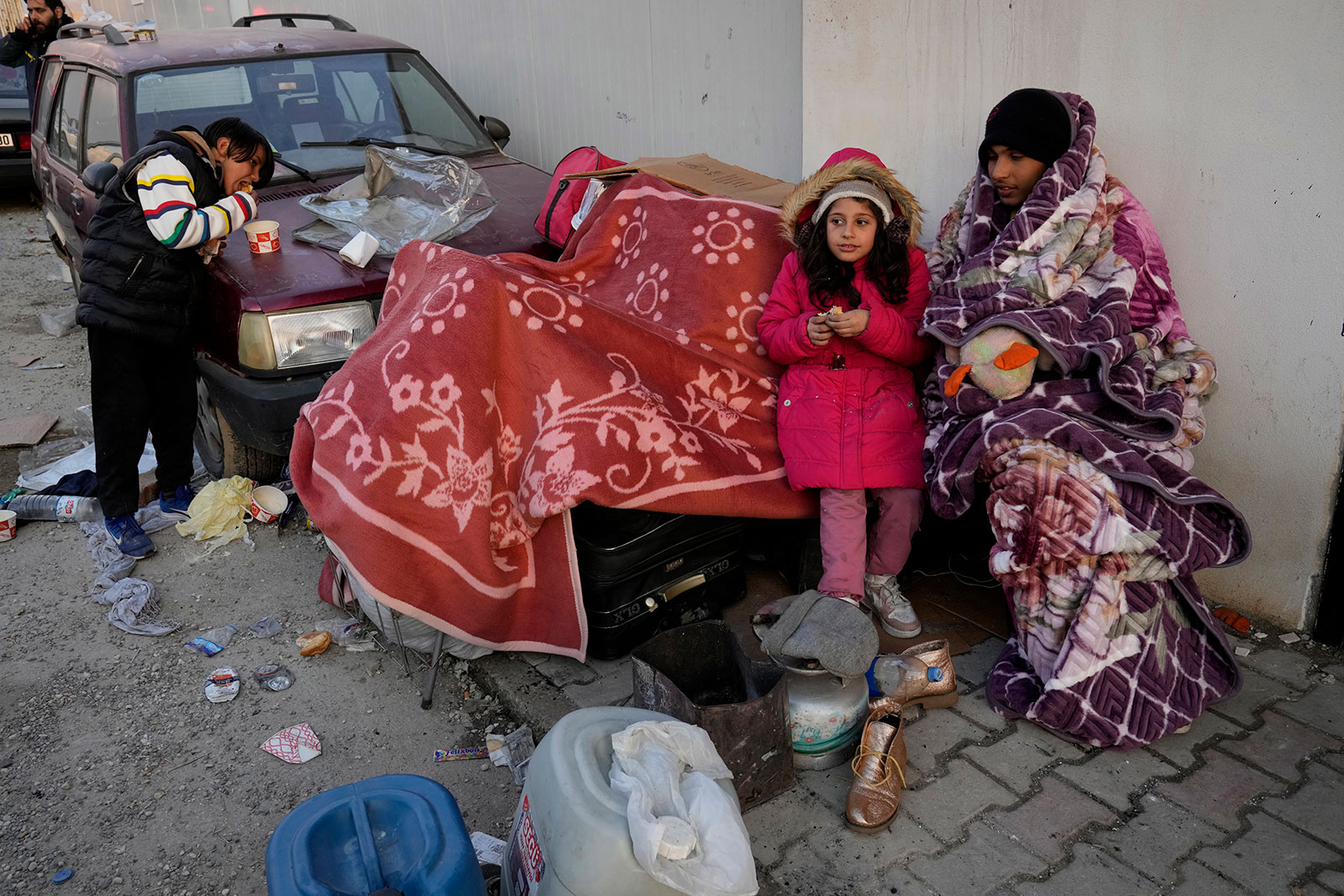 Syrians gather at a shelter in Antakya, southeastern Turkey, on Friday. 