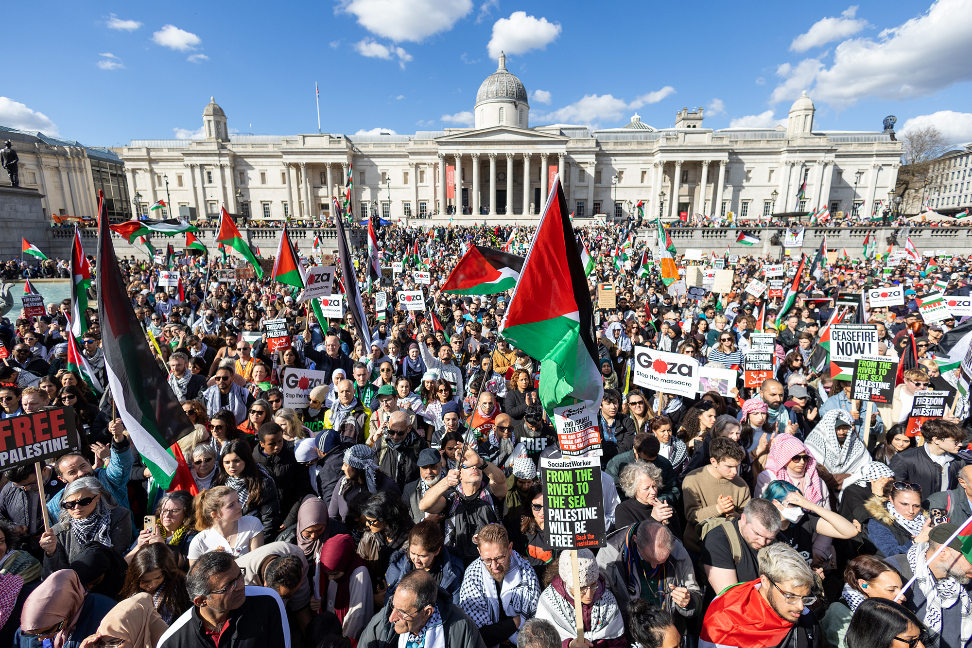 Thousands of protesters gather to call for a ceasefire in Gaza on March 30, in London. 