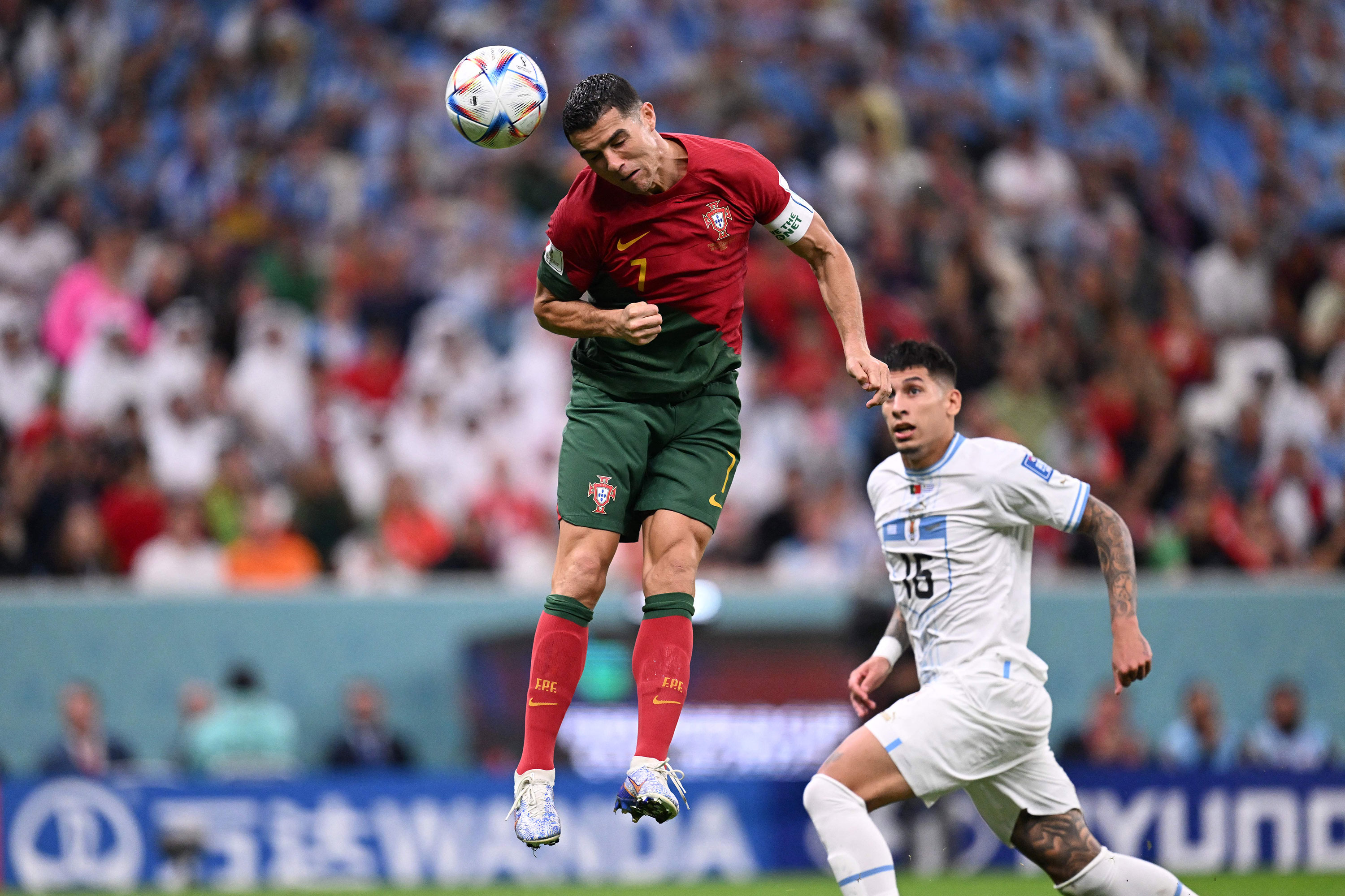Portugal's Cristiano Ronaldo jumps up to head the ball on Monday.