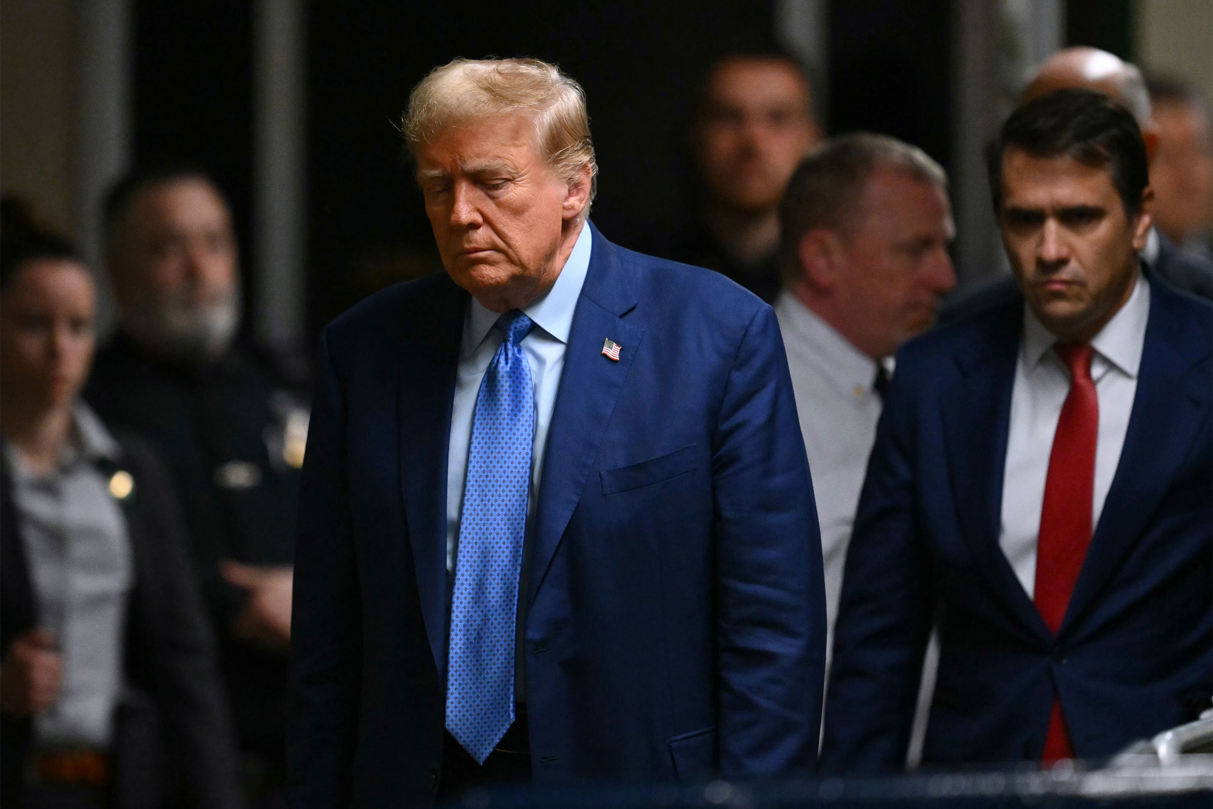 Former President Donald Trump arrives at his trial for allegedly covering up hush money payments at Manhattan Criminal Court on May 9 in New York City. 