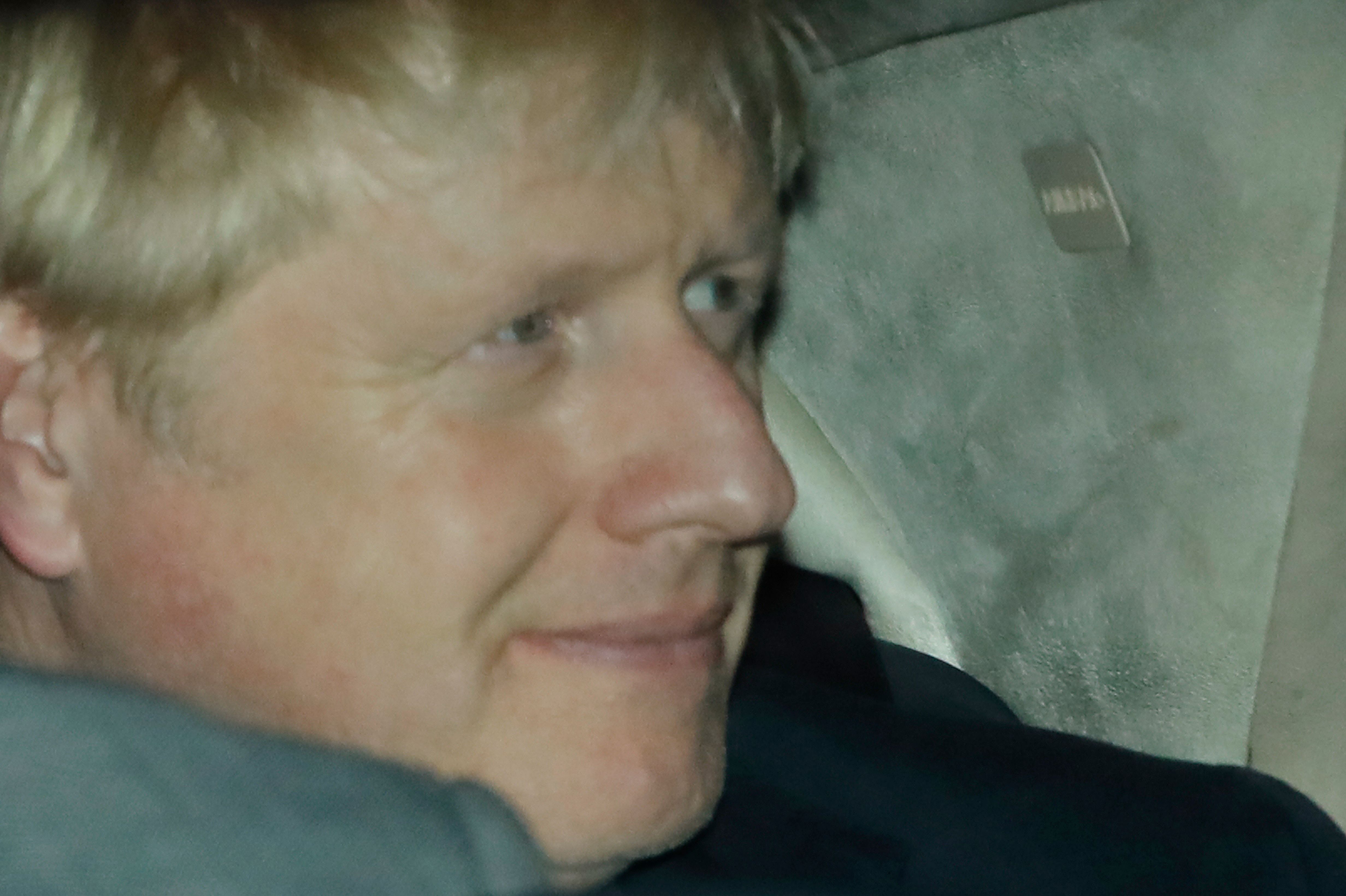 Britain's Prime Minister Boris Johnson leaves the Houses of Parliament on October 22.