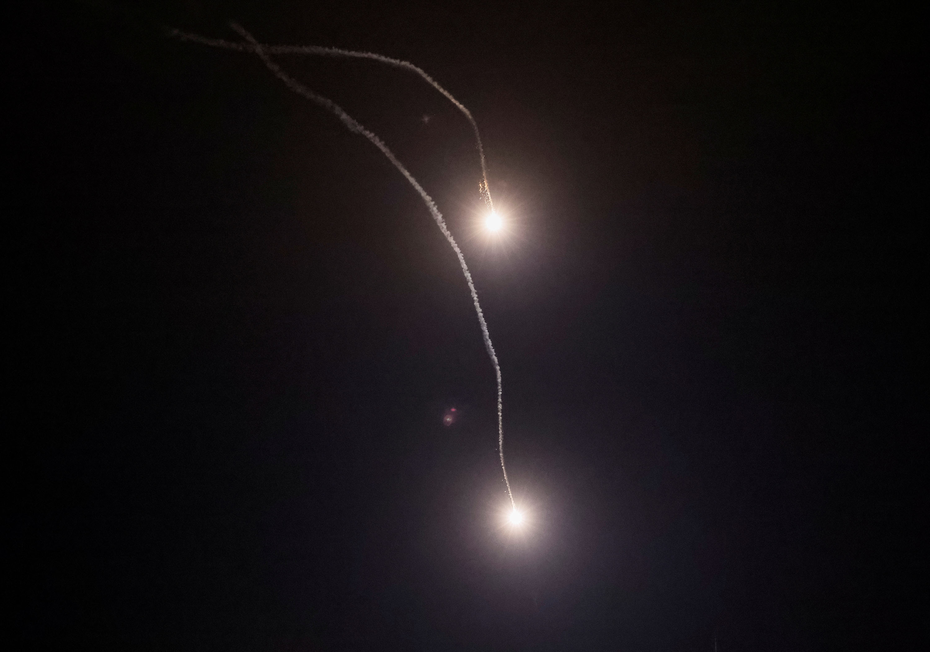 Traces of explosions are seen in the sky over Kyiv during a Russian missile strike on May 16. 