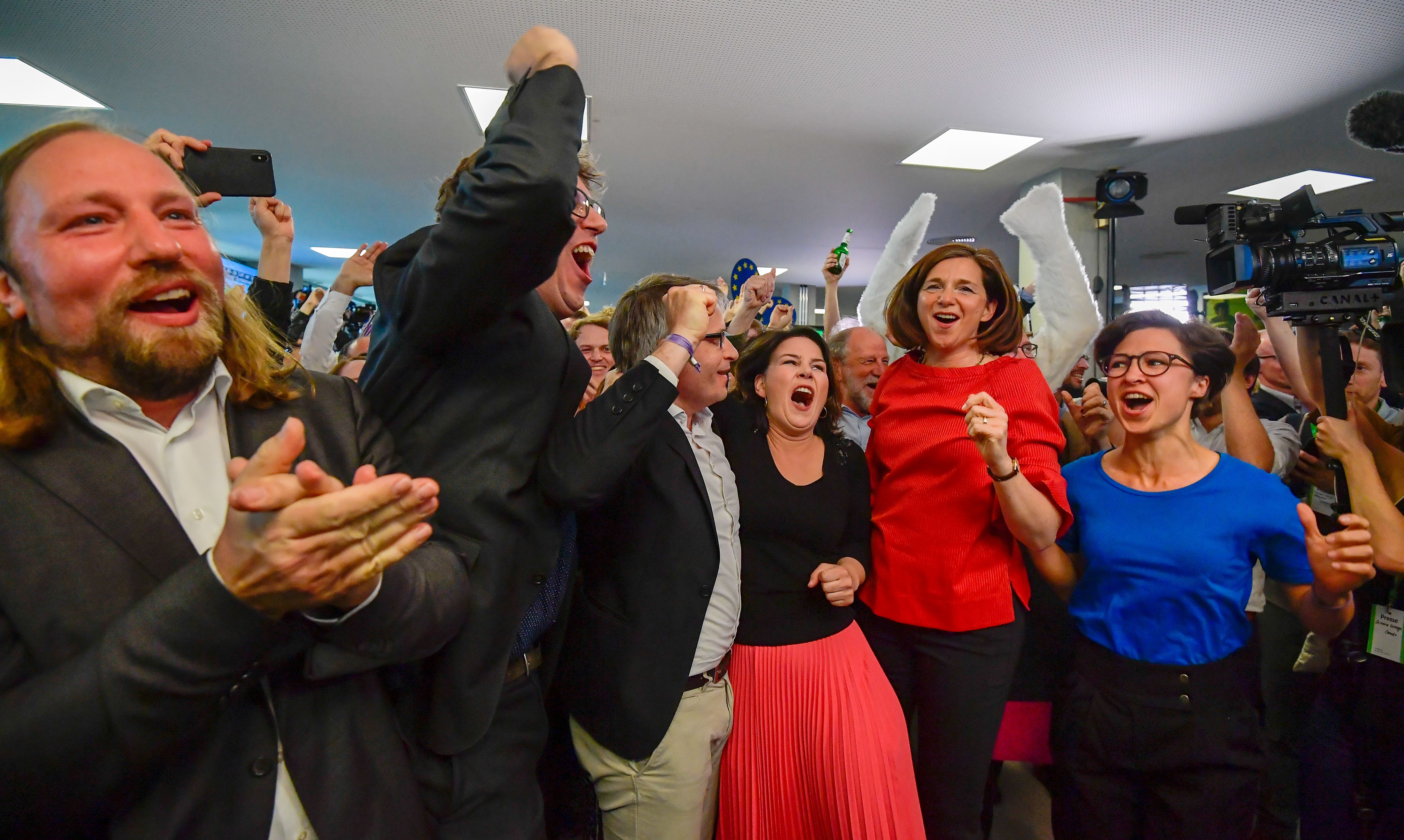 The Greens celebrate as exit poll are announced on public broadcast TV stations during the election evening on May 26