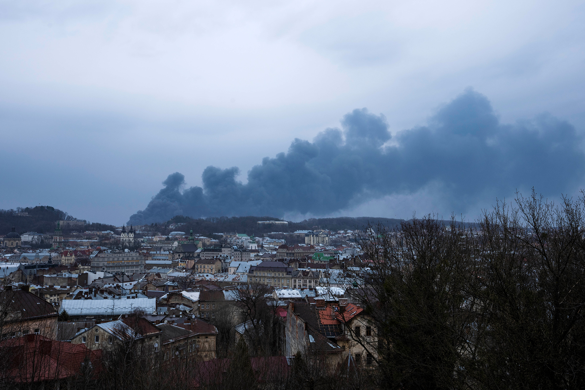 Smoke rises above Lviv, Ukraine on March 26.