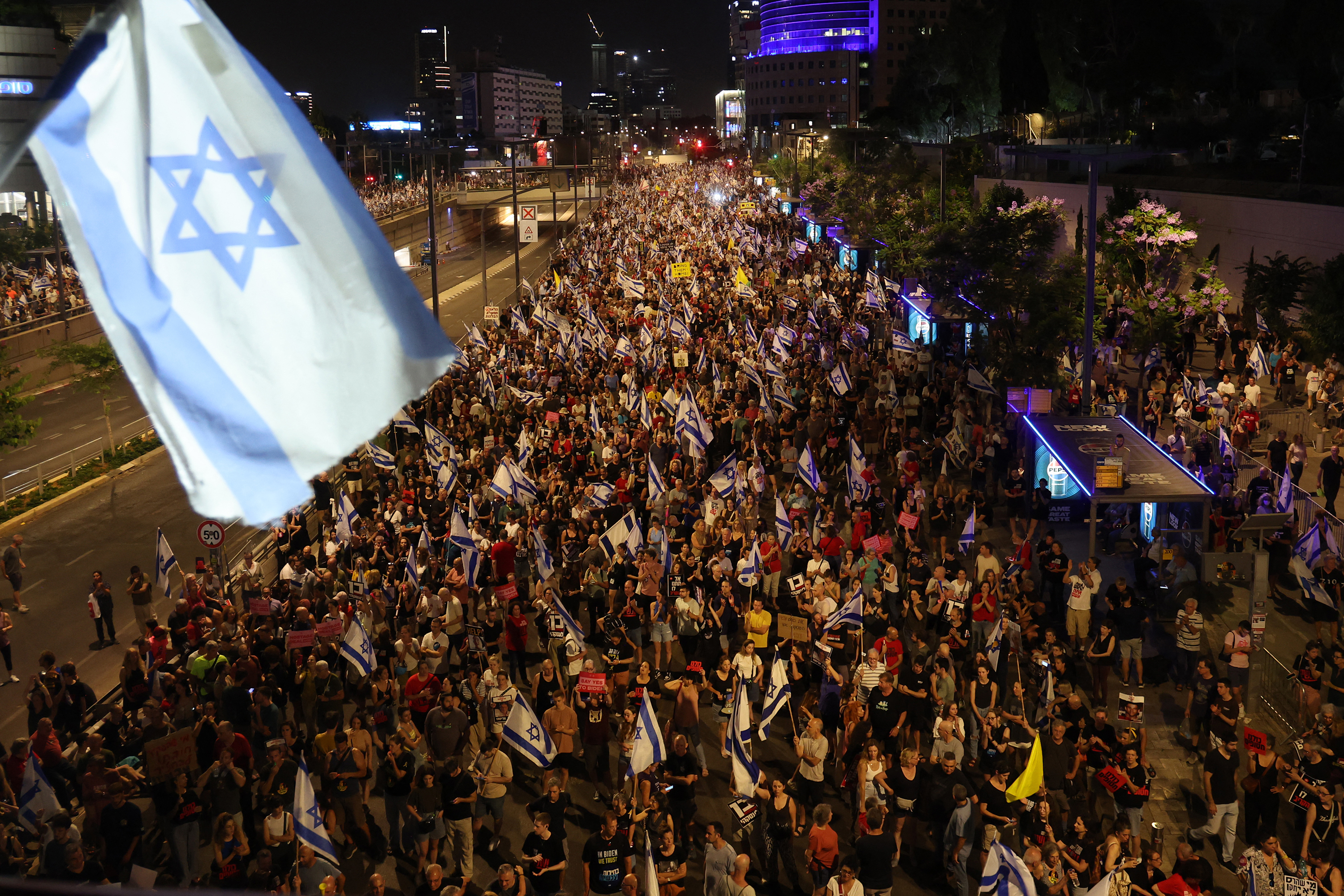 People attend a protest calling for the release of Israeli hostages in Tel Aviv, Israel, on June 8.