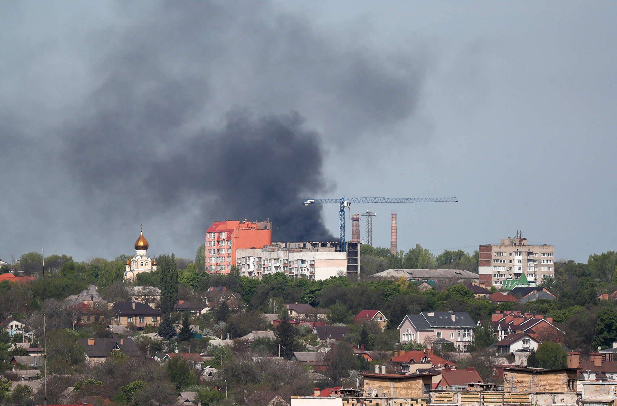 Smoke rises above a burning oil storage on the outskirts of Donetsk, Ukraine,  May 4.