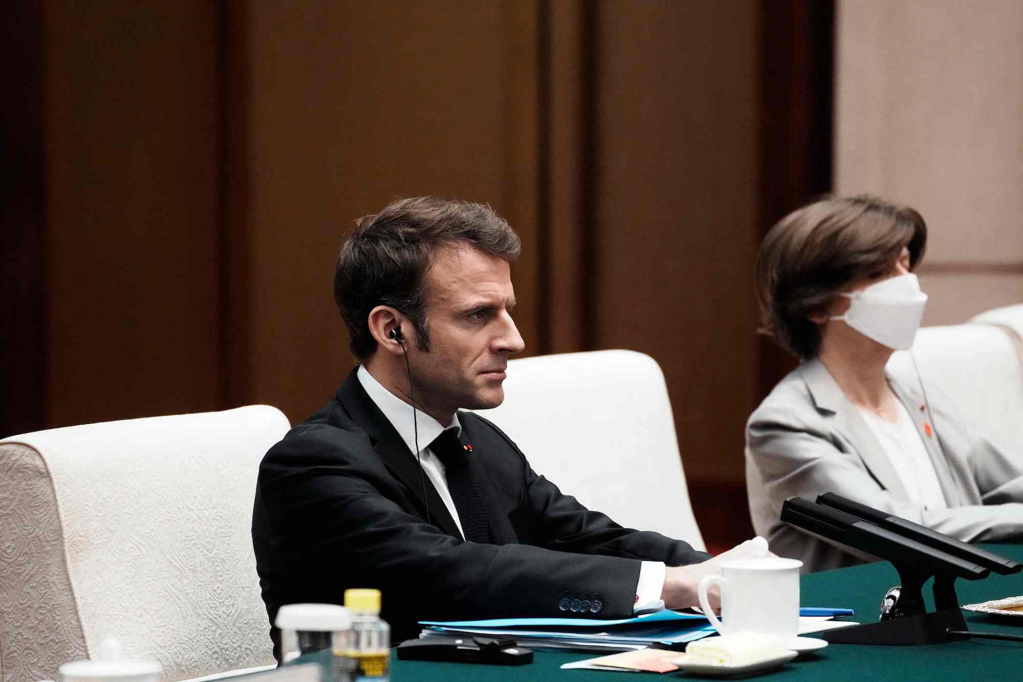 French President Emmanuel Macron attends a meeting at the Great Hall of the People in Beijing on Thursday.