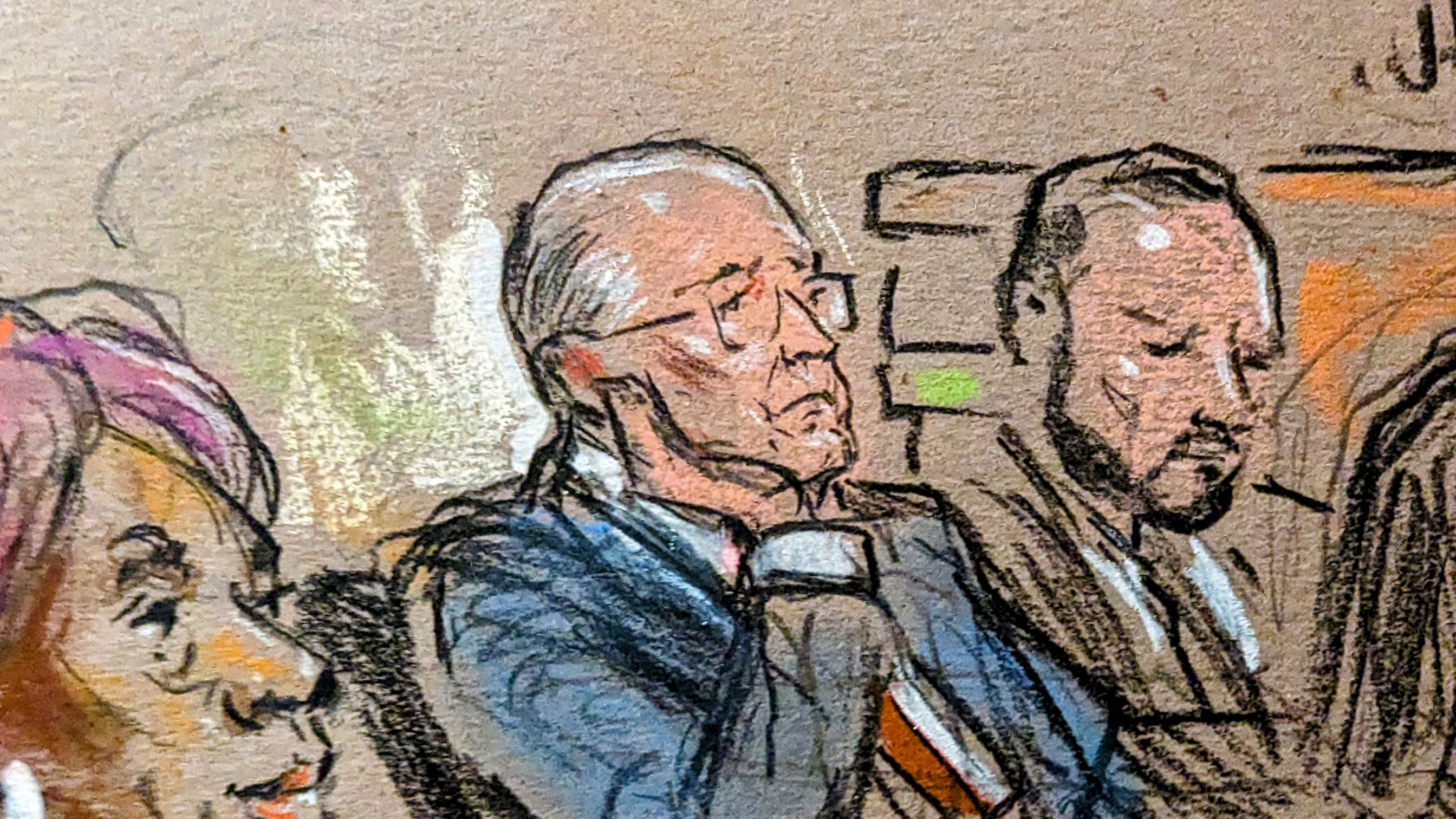 Rudy Giuliani listens to the verdict being read. 