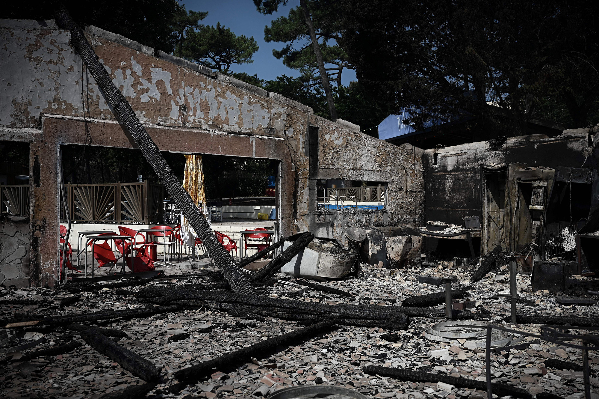 Damage at "Les Flots Bleus" camp on Tuesday, July 19, which has been ravaged by a wildfire in Pyla sur Mer in Gironde, located in the southwest of France. 