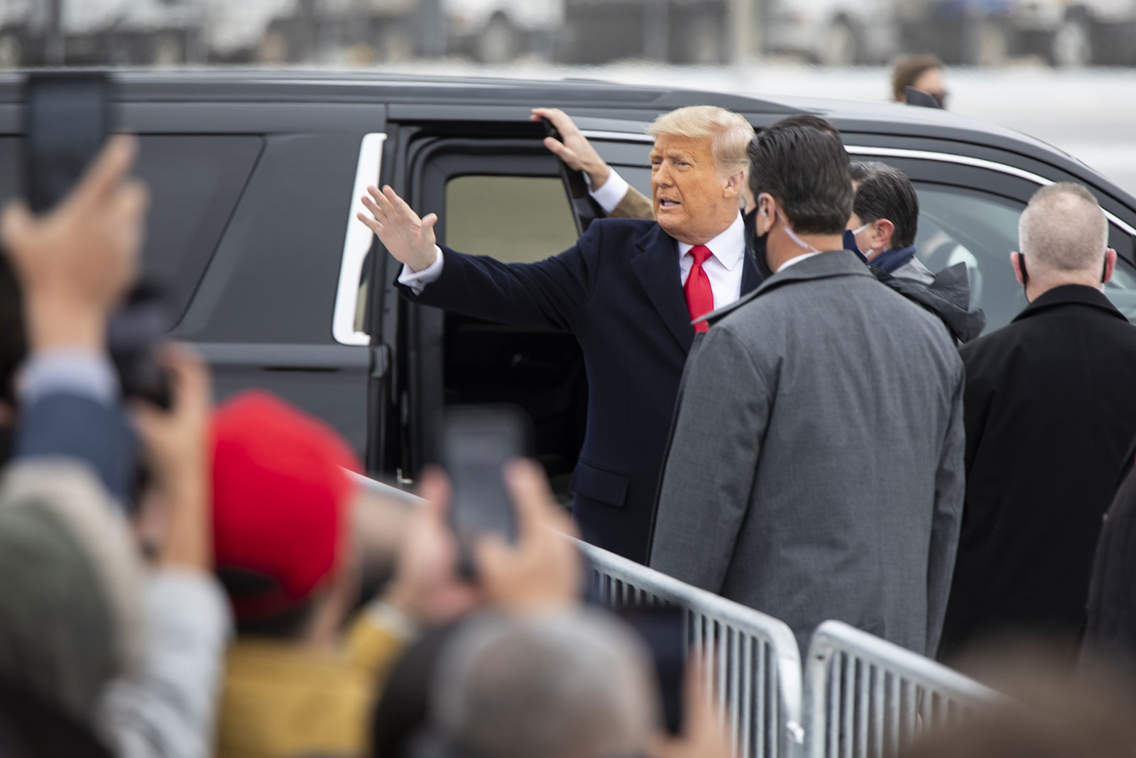 Former President Donald Trump greets supporters after arriving in Harlingen, Texas, on January 12, 2021.