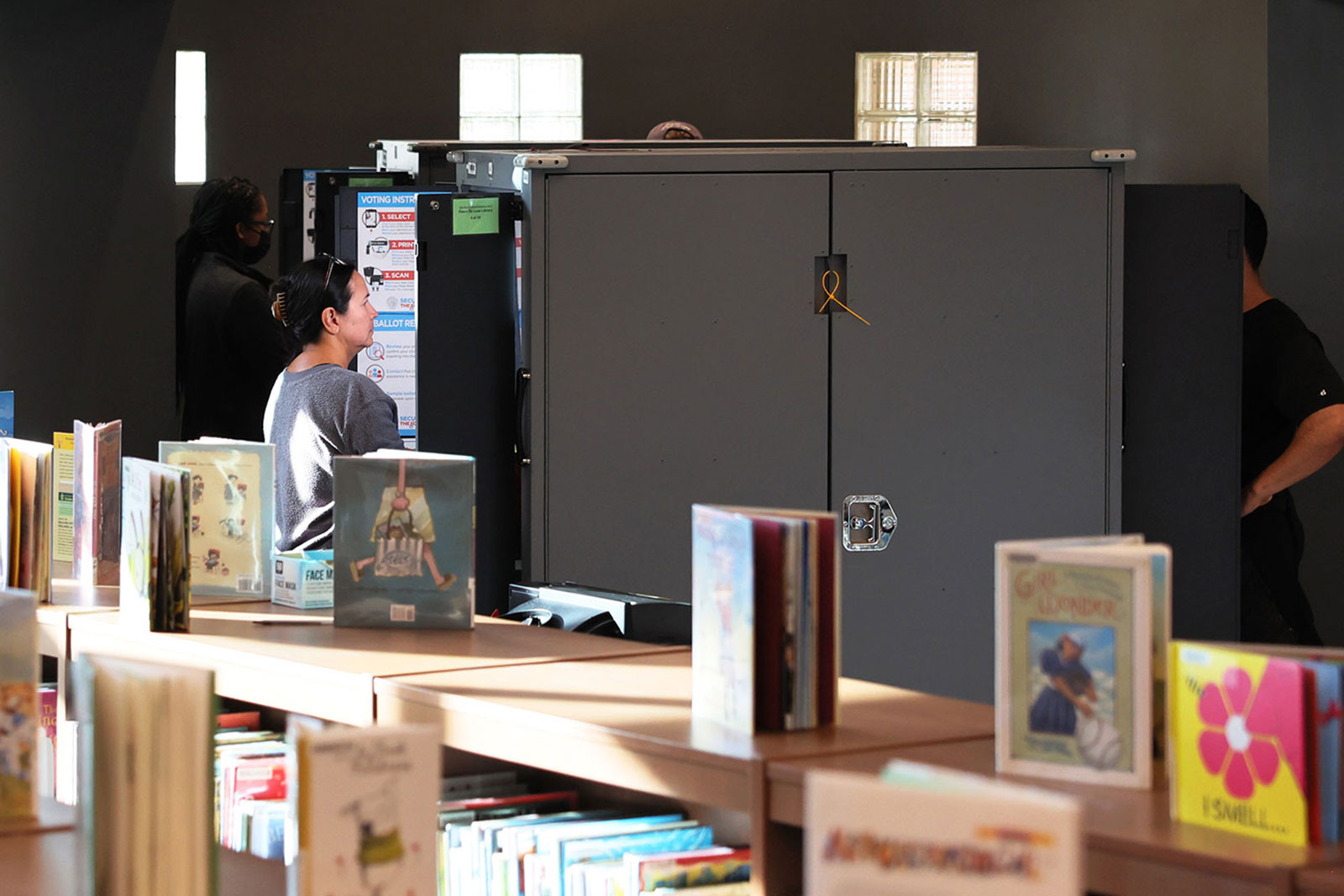 People cast their ballot during early voting for the midterm elections at a public library in Atlanta on November 4. 