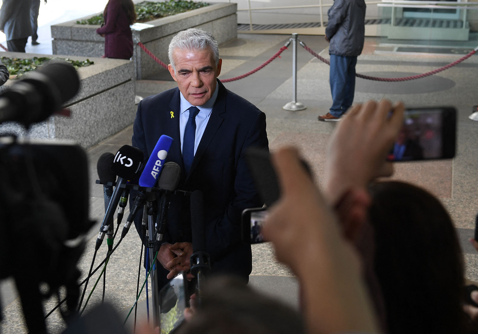 Israeli opposition leader Yair Lapid speaks to reporters after meeting with US Secretary of State Antony Blinken at the US State Department on Monday in Washington, DC. 