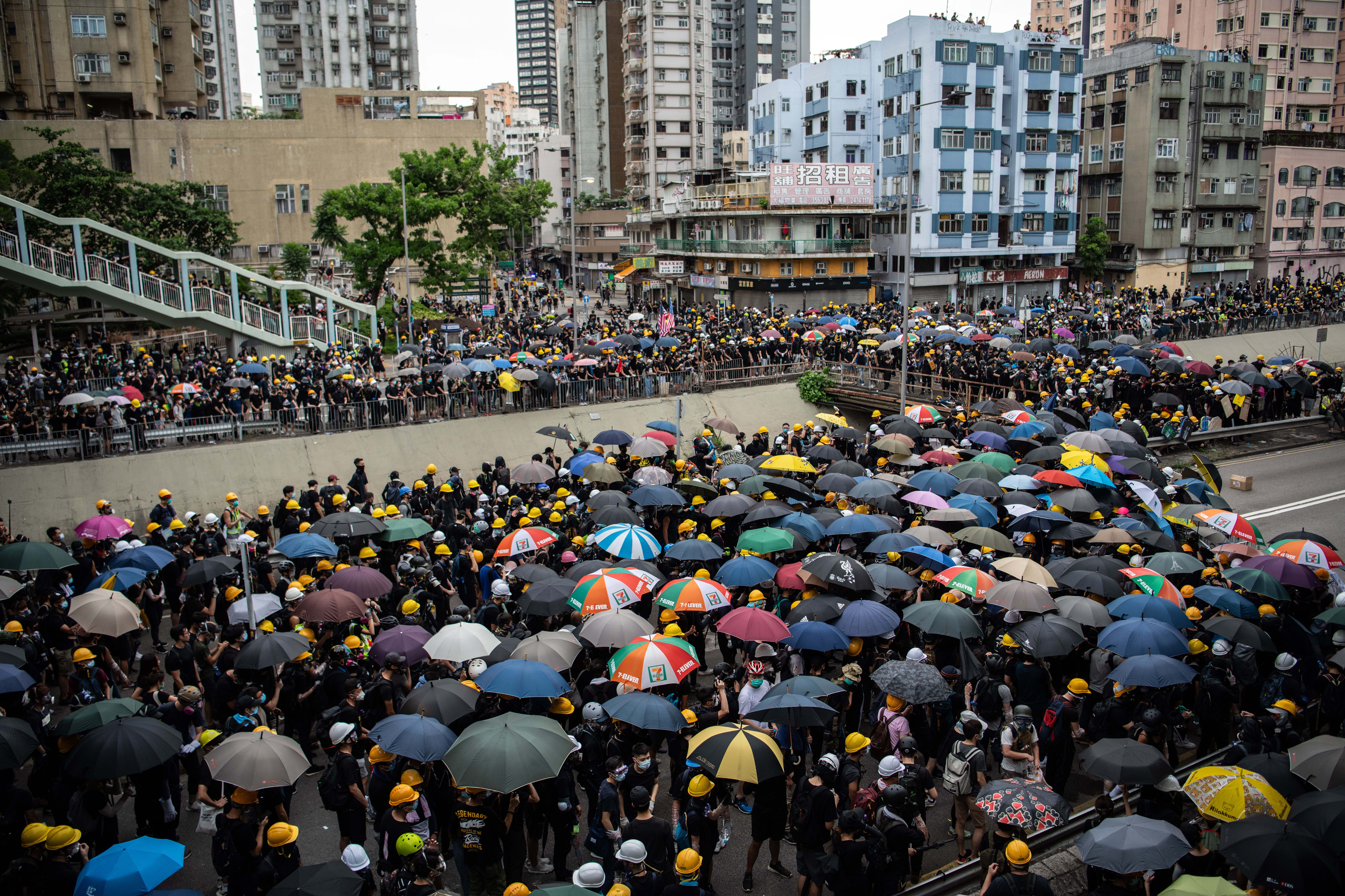 Protest live updates: Riot police face off with protesters in Hong Kong ...