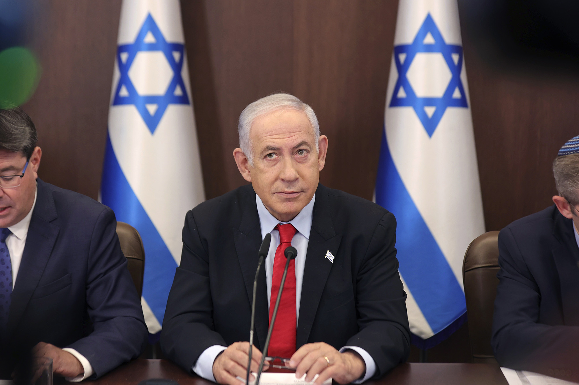 Israeli Prime Minister Benjamin Netanyahu, center, attends the weekly cabinet meeting at the prime minister's office in Jerusalem on September 27, 2023.