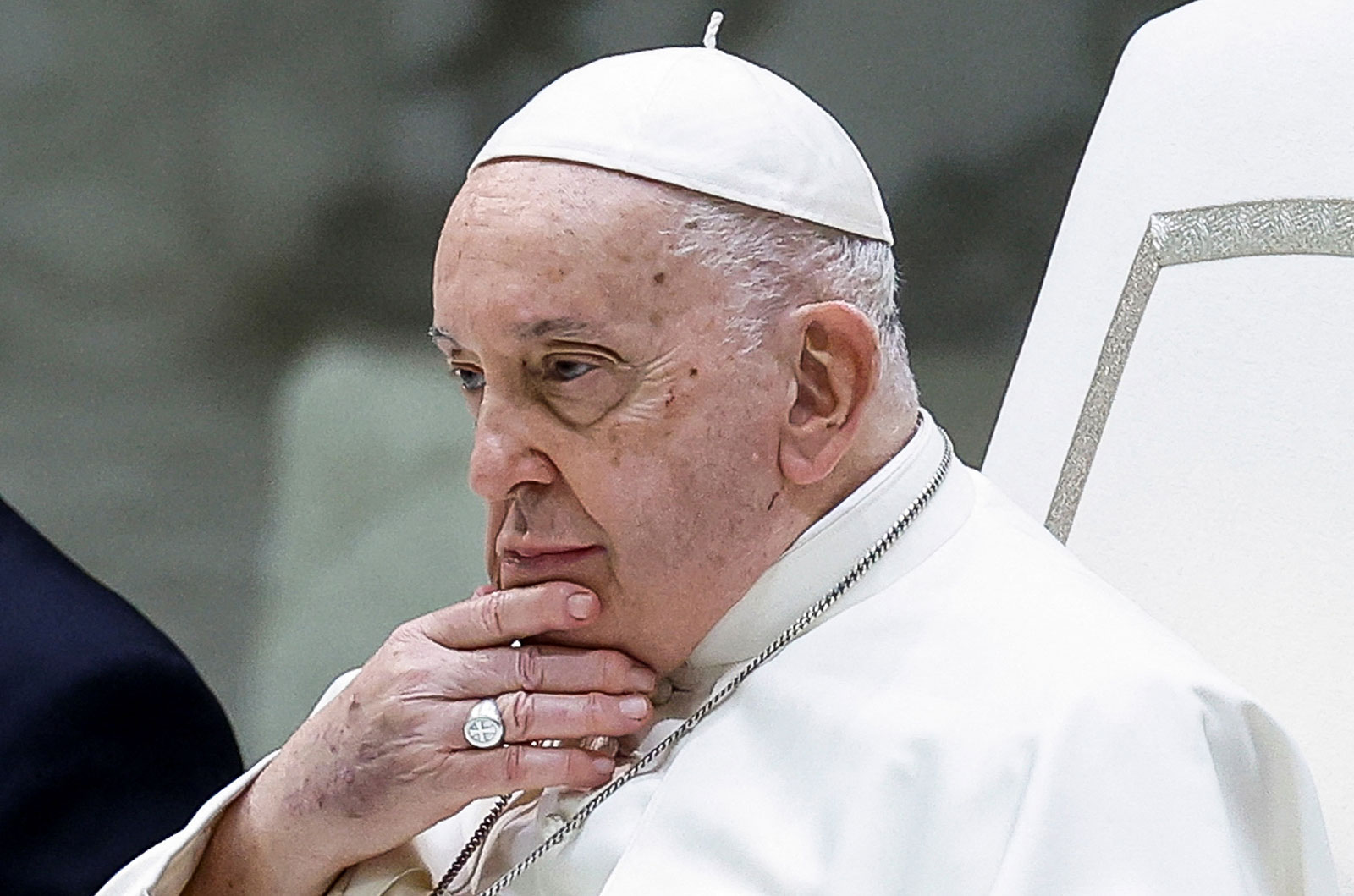Pope Francis looks on as he attends the weekly general audience at the Vatican on November 29.
