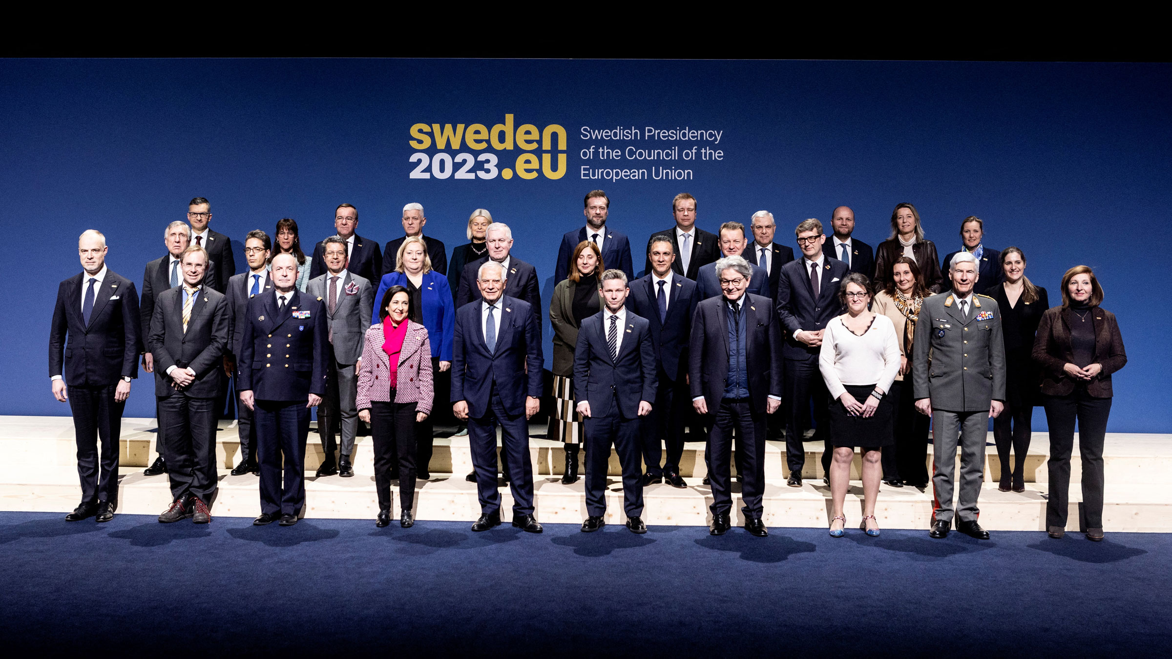Officials pose for a group photo during a meeting of European Union defense ministers on Wednesday. 