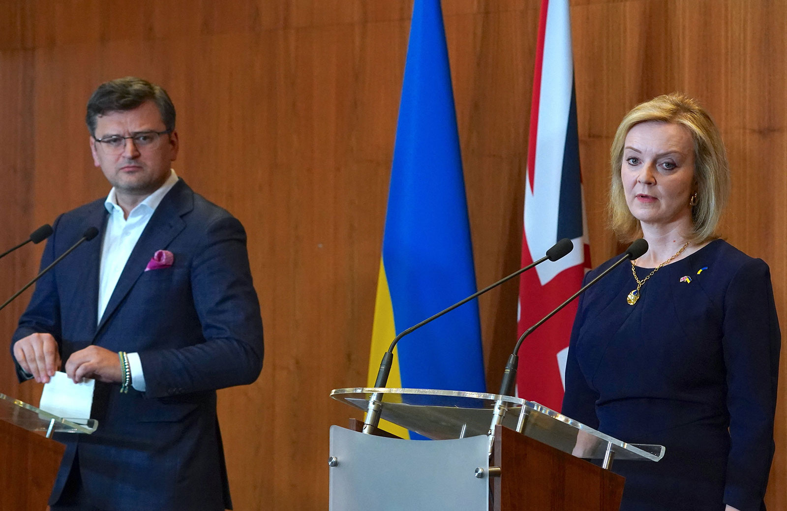 British Foreign Secretary Liz Truss, right, and Ukrainian Foreign Minister Dmytro Kuleba give a press statement at the British Embassy in Warsaw on April 4. 