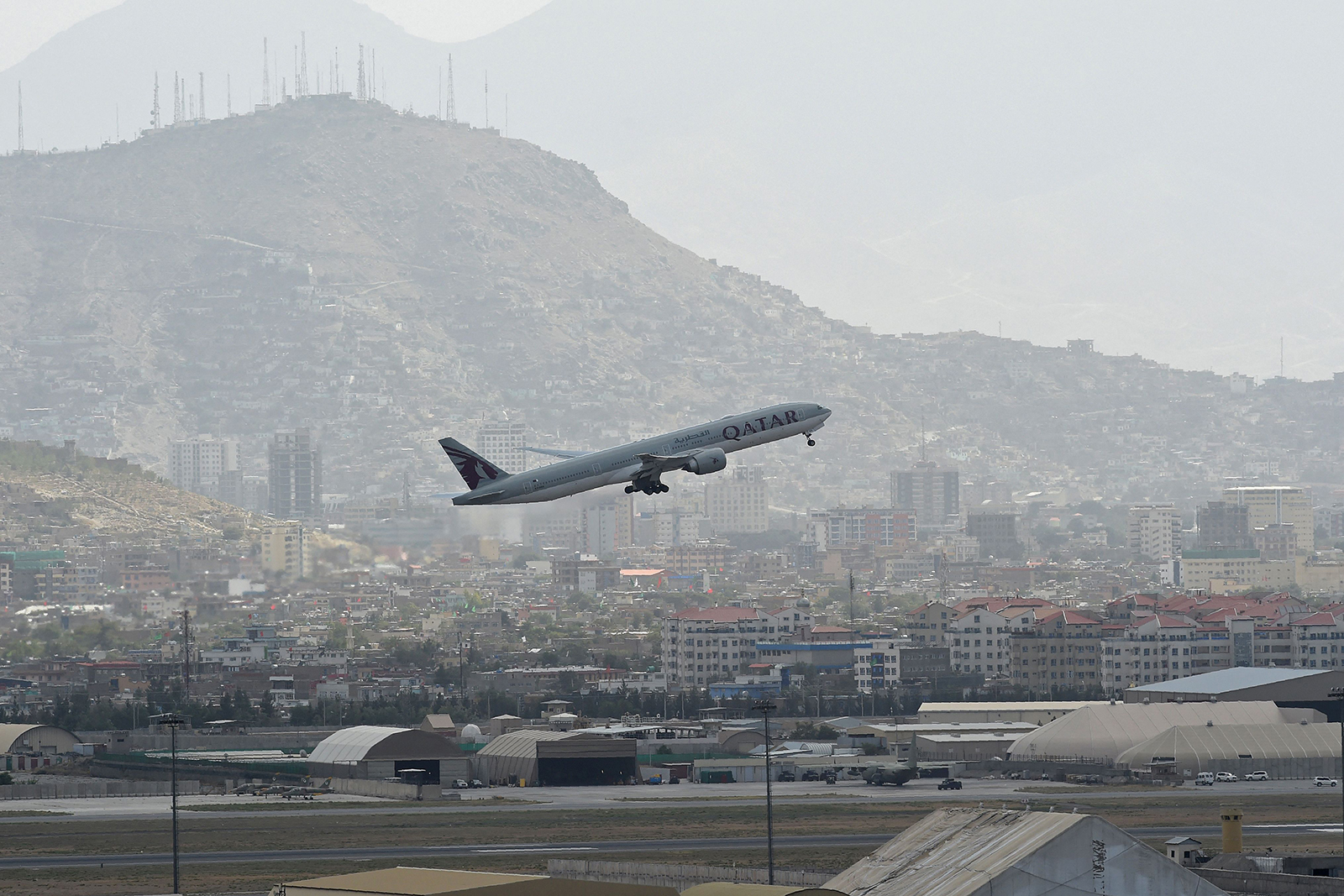 A Qatar Airways aircraft takes off from the airport in Kabul on August 14. 