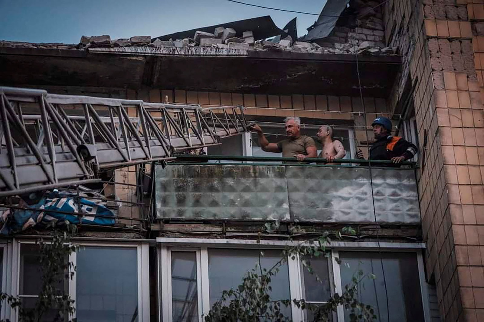 Rescuers work at a residential building was damaged during a Russian missile strike  in Pokrovsk, Ukraine, on Monday, August 7.