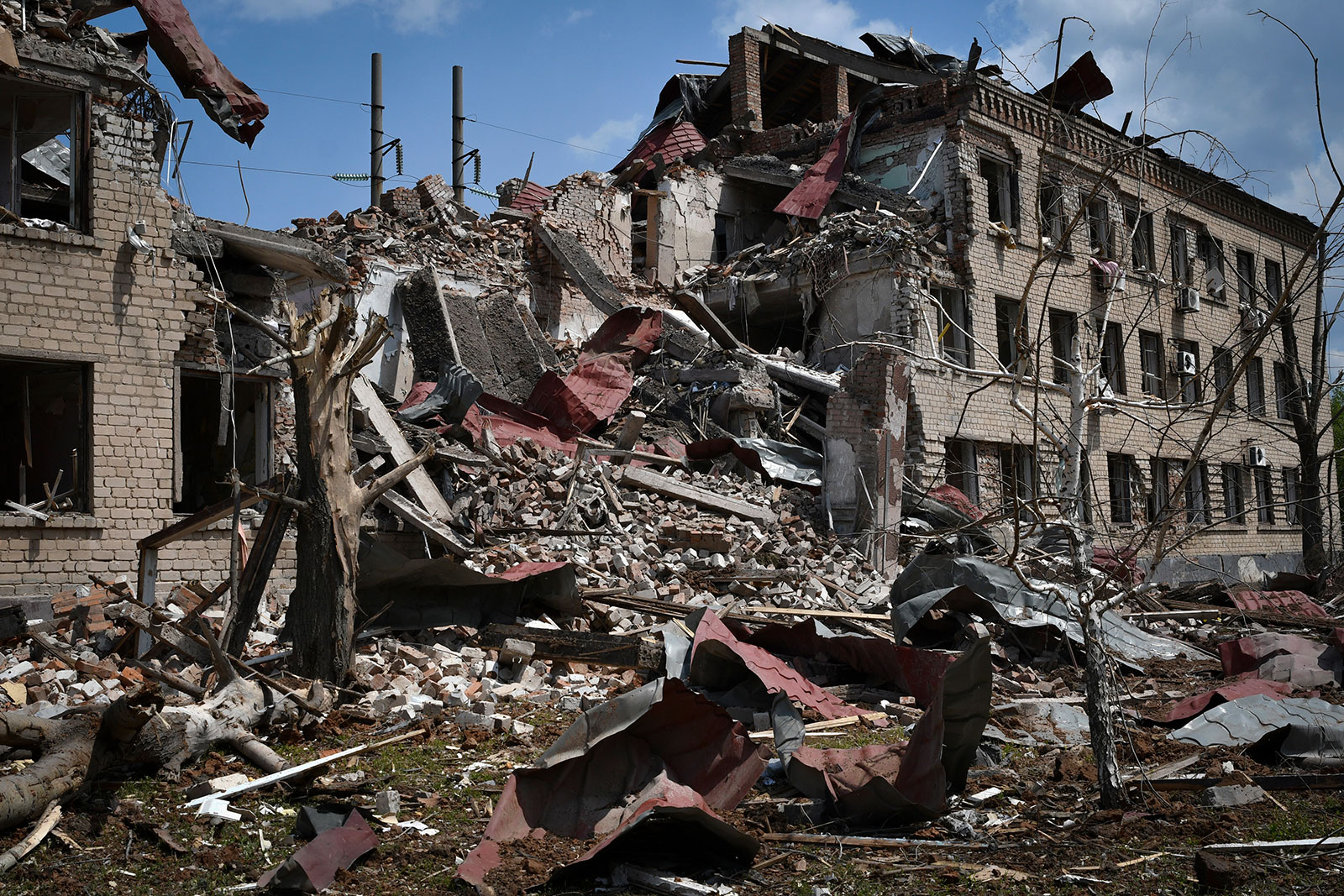 Destroyed houses are seen after Russian shelling in Donetsk region of Soledar, Ukraine, on Tuesday, May 24. 