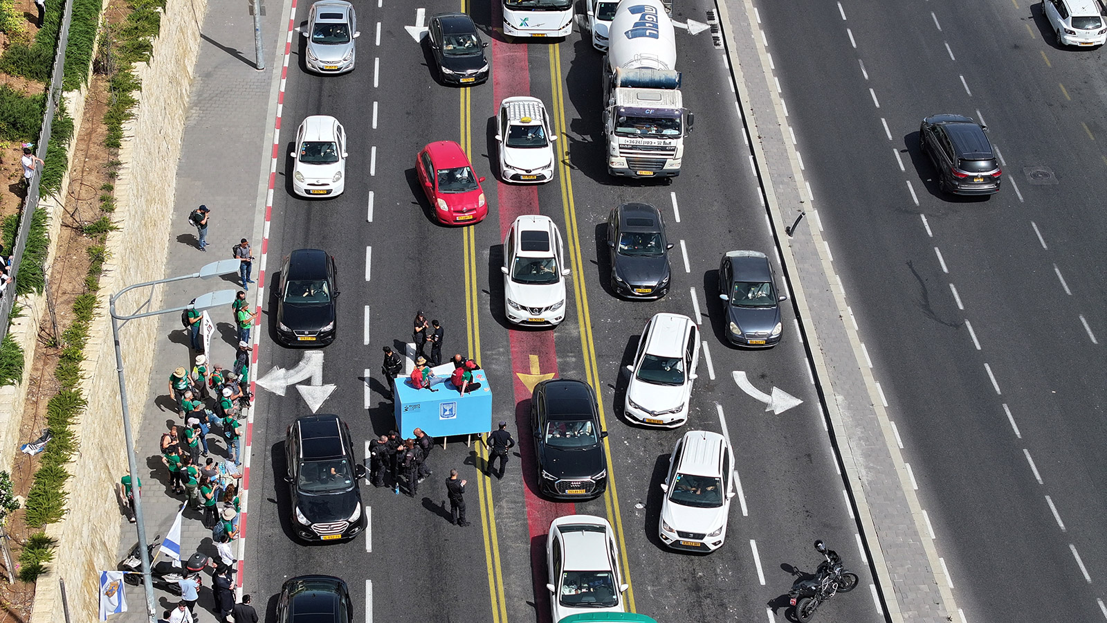 Demonstrators use a giant, mock ballot box to block traffic during a protest against Israeli Prime Minister Benjamin Netanyahu's government at the entrance to Jerusalem on May 19.