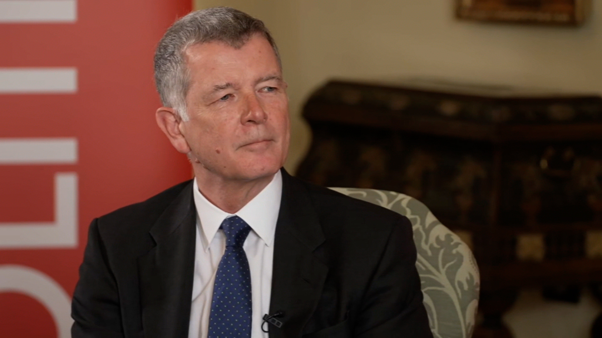 British intelligence chief Richard Moore speaks in Prague, Czech Republic, on July 19.