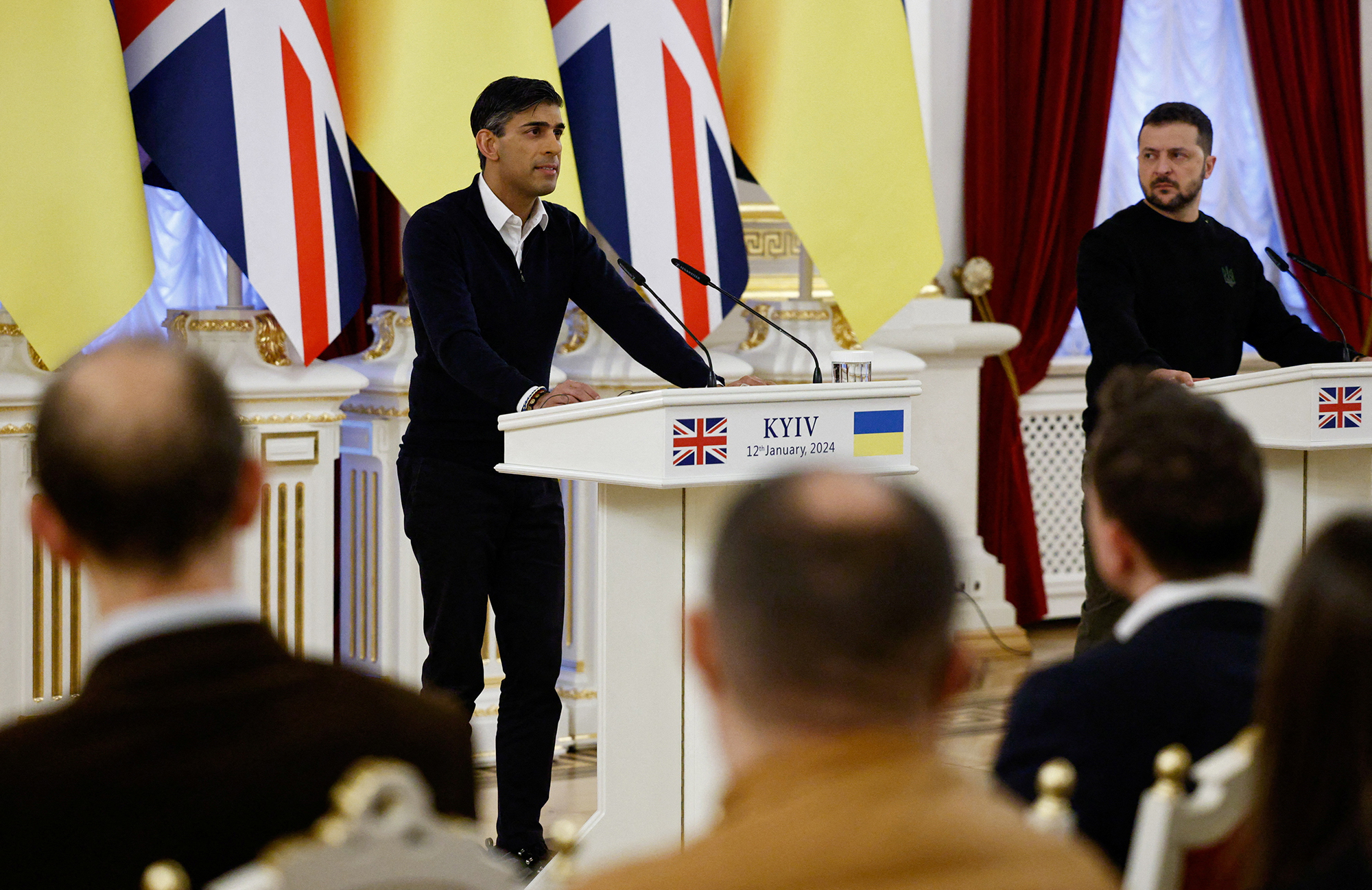 Ukrainian President Volodymyr Zelensky, right, looks on as British Prime Minister Rishi Sunak speaks in Kyiv, Ukraine, on January 12.