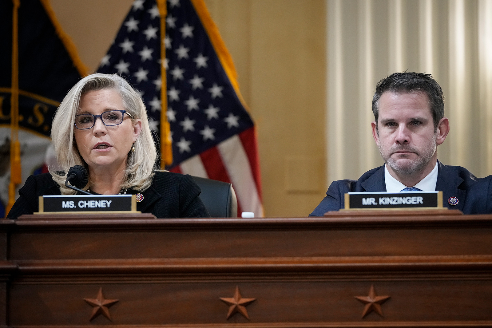 Rep. Liz Cheney (R-WY), vice-chair of the select committee investigating the January 6 attack on the Capitol, and Rep. Adam Kinzinger (R-IL) listen during a committee meeting on Capitol Hill on December 1, in Washington, DC. (Drew Angerer/Getty Images)