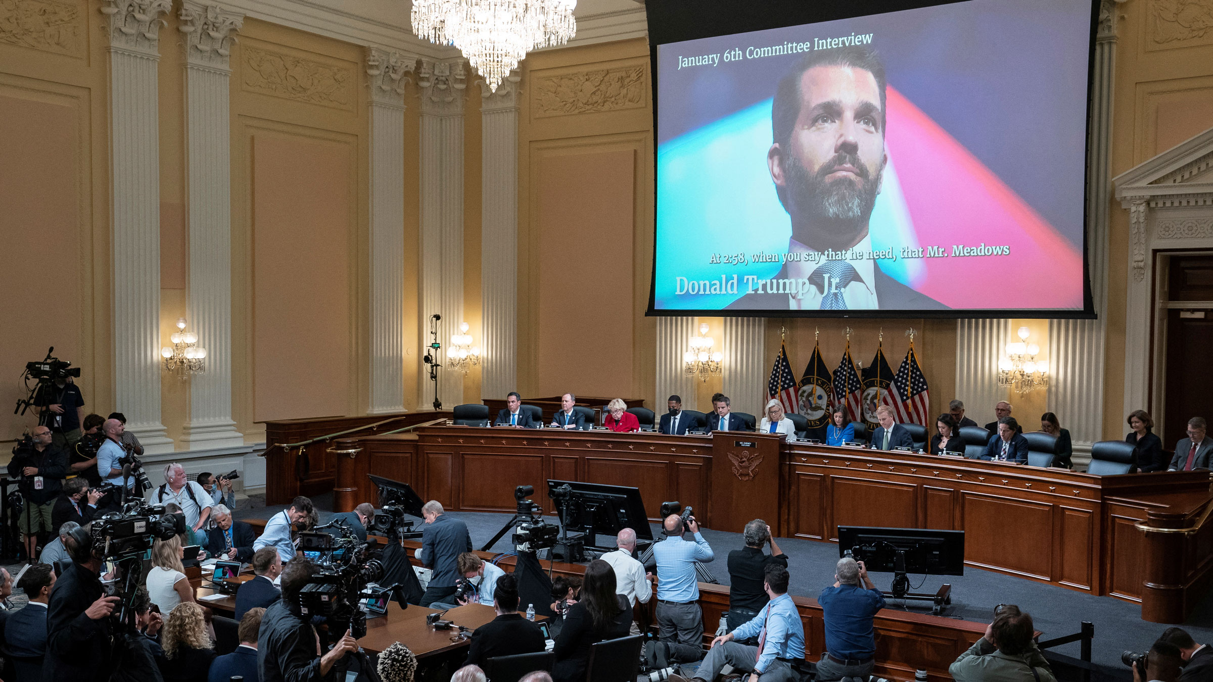 A still image of Donald Trump Jr. is seen on a screen as audio from his deposition is played during Thursday's hearing.