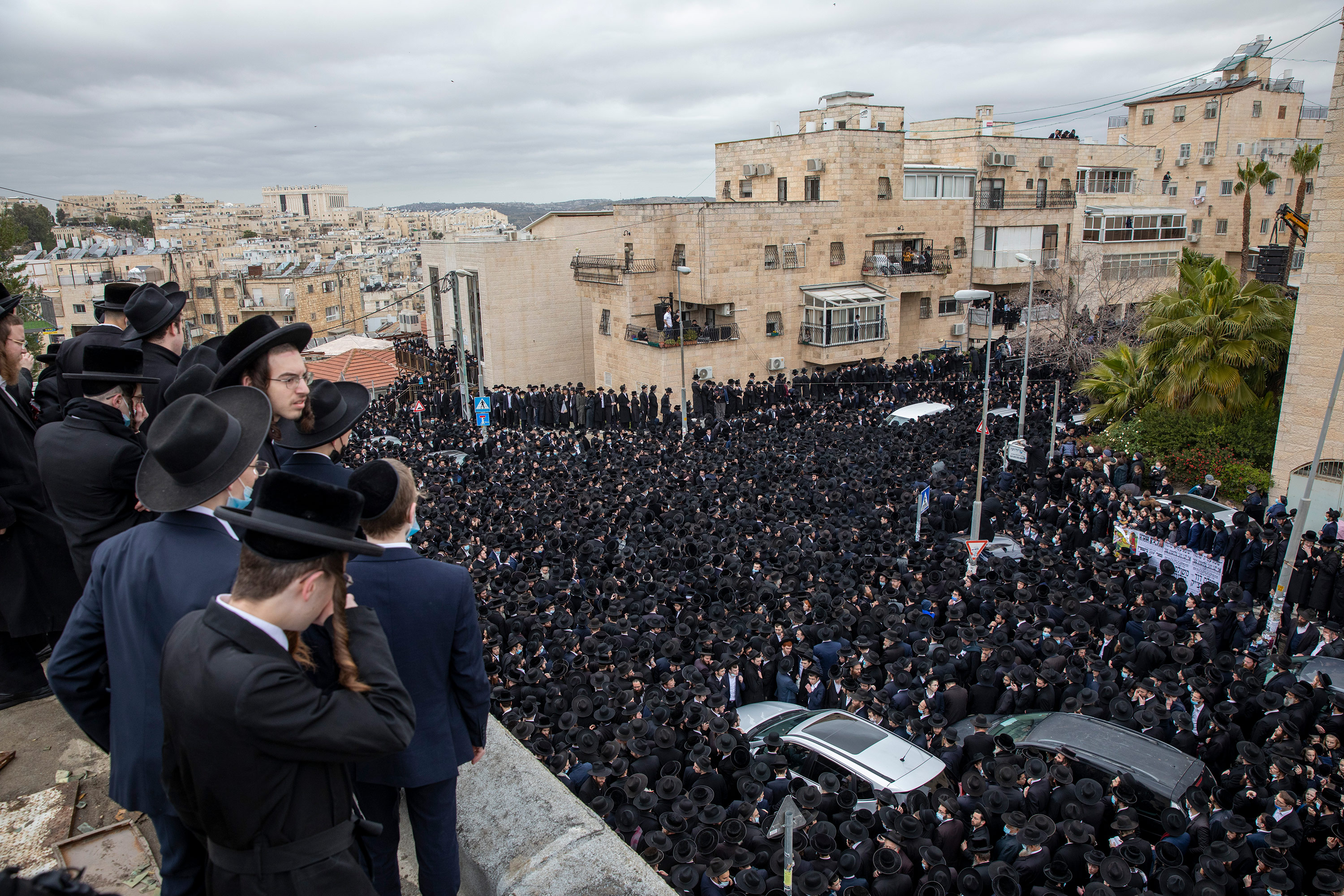 Thousands of members of the ultra-Orthodox community participate in a funeral for prominent rabbi Meshulam Soloveitchik, in Jerusalem, on January 31. 