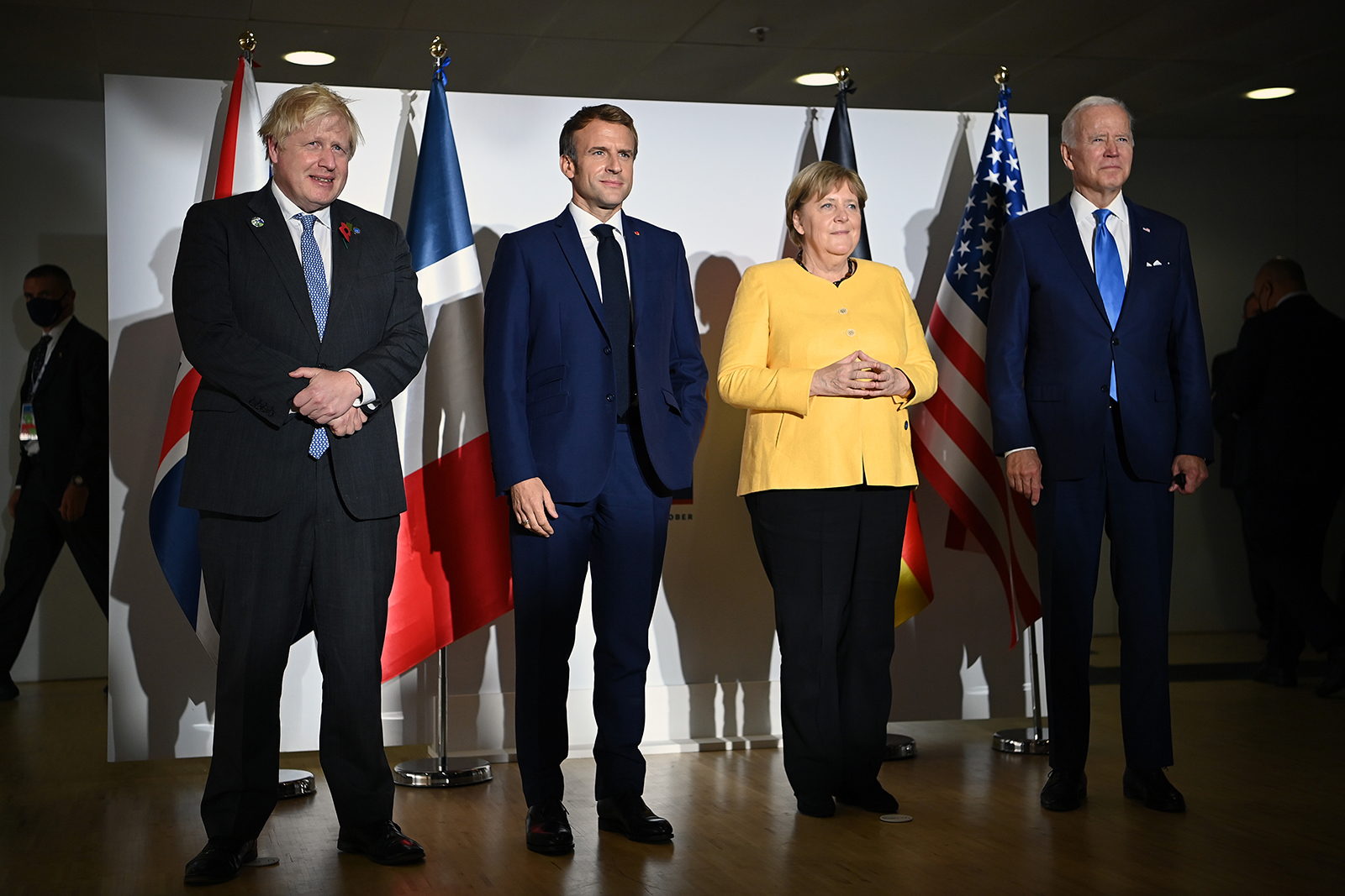 British Prime Minister Boris Johnson, French President Emmanuel Macron, German Chancellor Angela Merkel and US President Joe Biden hold an E3 meeting at the G20 Summit on October 30, in Rome.