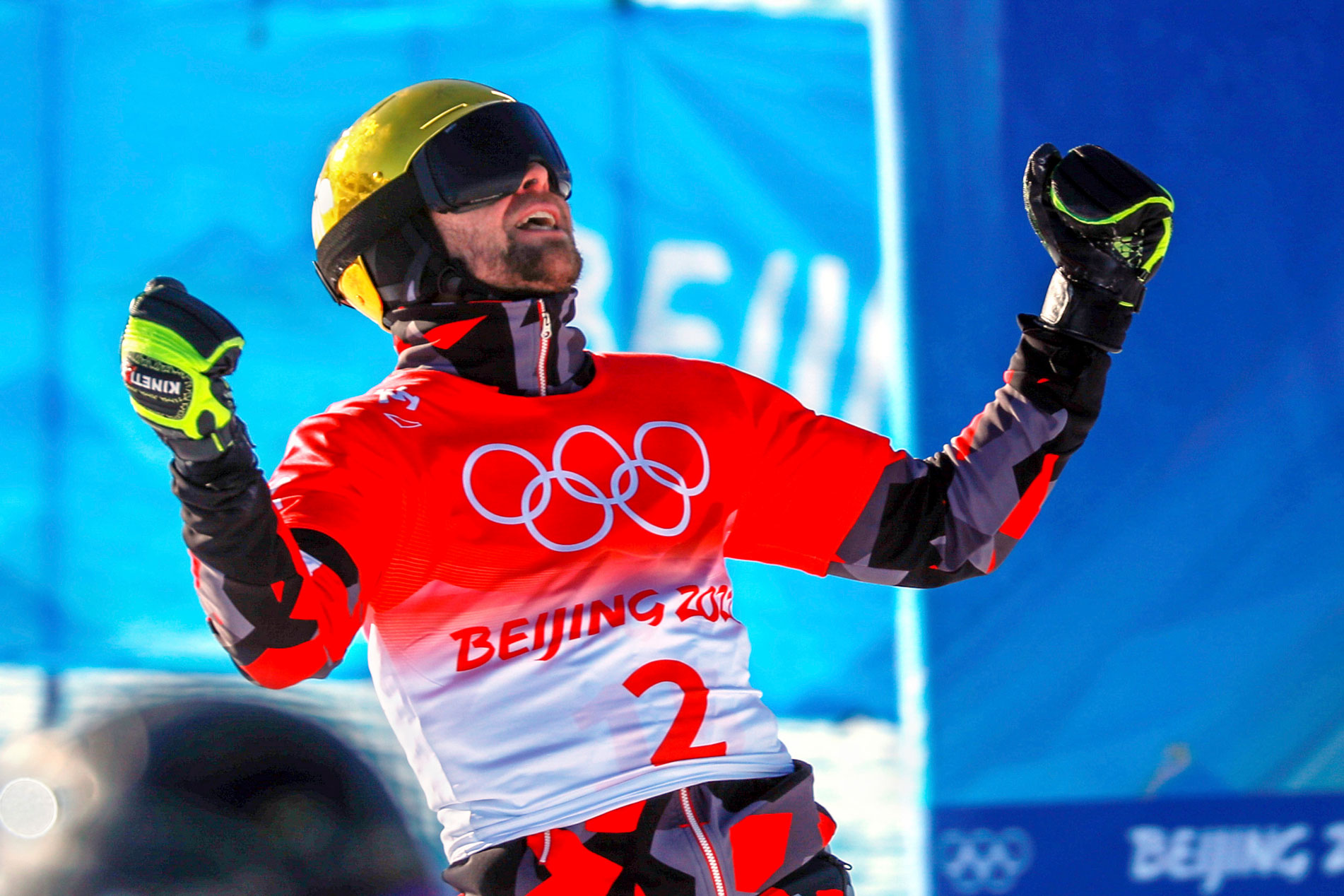 Austria's Benjamin Karl celebrates winning the gold medal at the men's parallel giant slalom final.