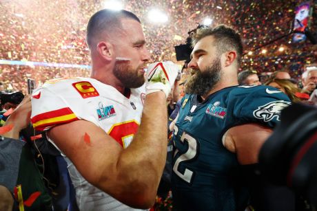 5) Kelce brothers embrace after playing on opposing sides of an  action-packed Super Bowl