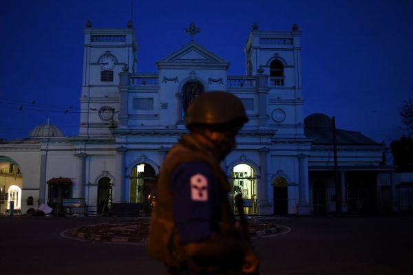 A security official stands guard outside St. Anthony's Shrine in Colombo in the early hours of April 23, 2019, two days after the church was hit in a series of bomb blasts targeting churches and luxury hotels in Sri Lanka. 