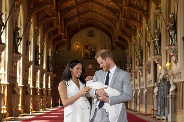 Britain's Prince Harry and Meghan, Duchess of Sussex, during a photocall with their newborn son, in St George's Hall at Windsor Castle, Windsor.